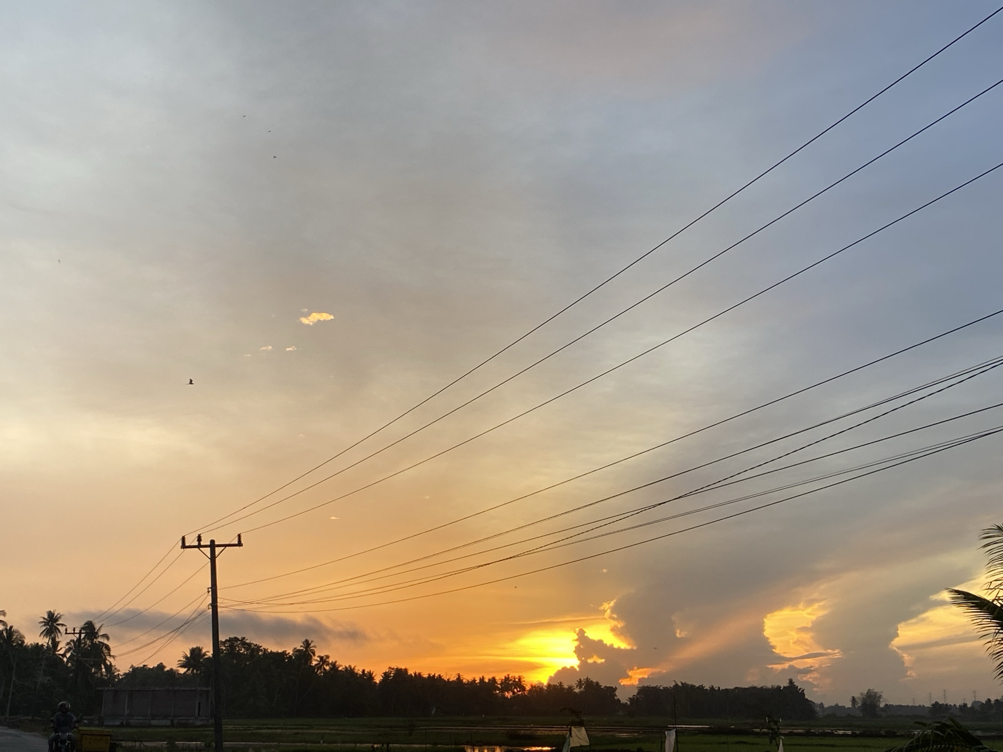 Vivid rural sunset over Keutapang, Indonesia