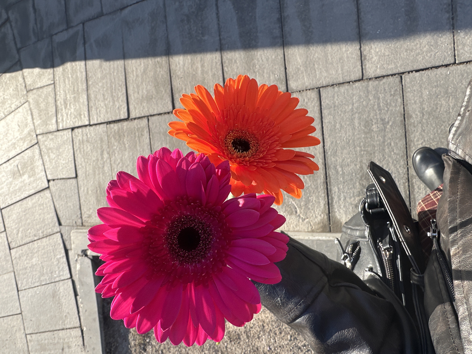 Flowers and personal items spotted on Moscow pavement