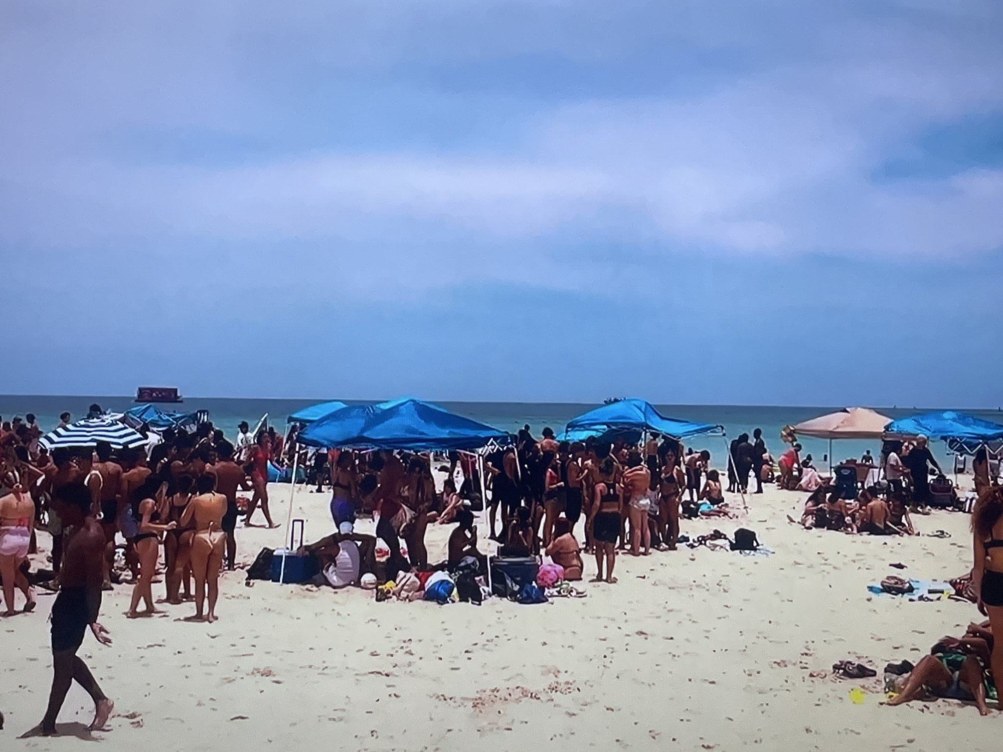 Crowded summer beach day with a fashion edge, Shakhovskaya