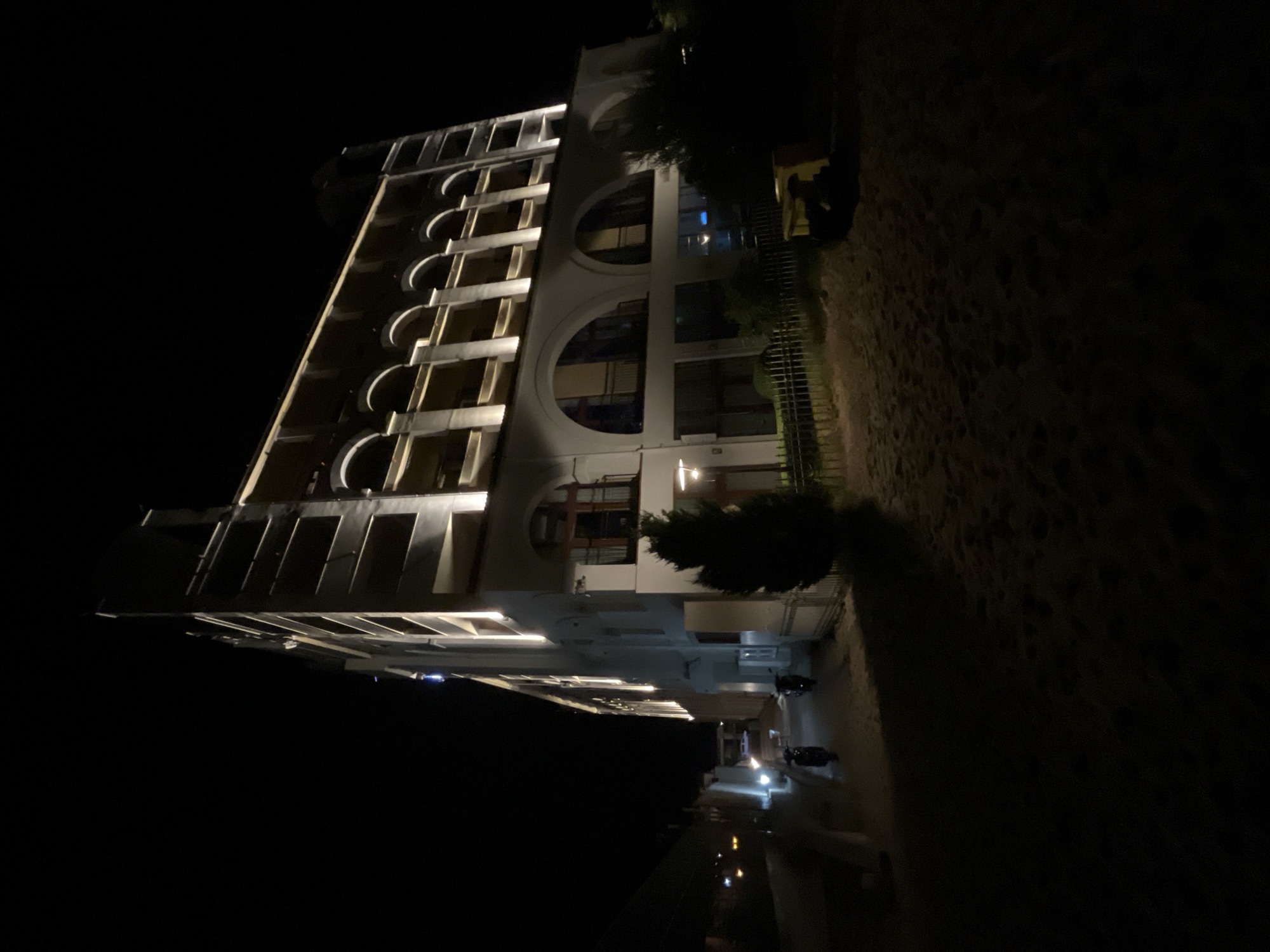 Summer night on Obzor's beachfront: hotels, moon, and promenade