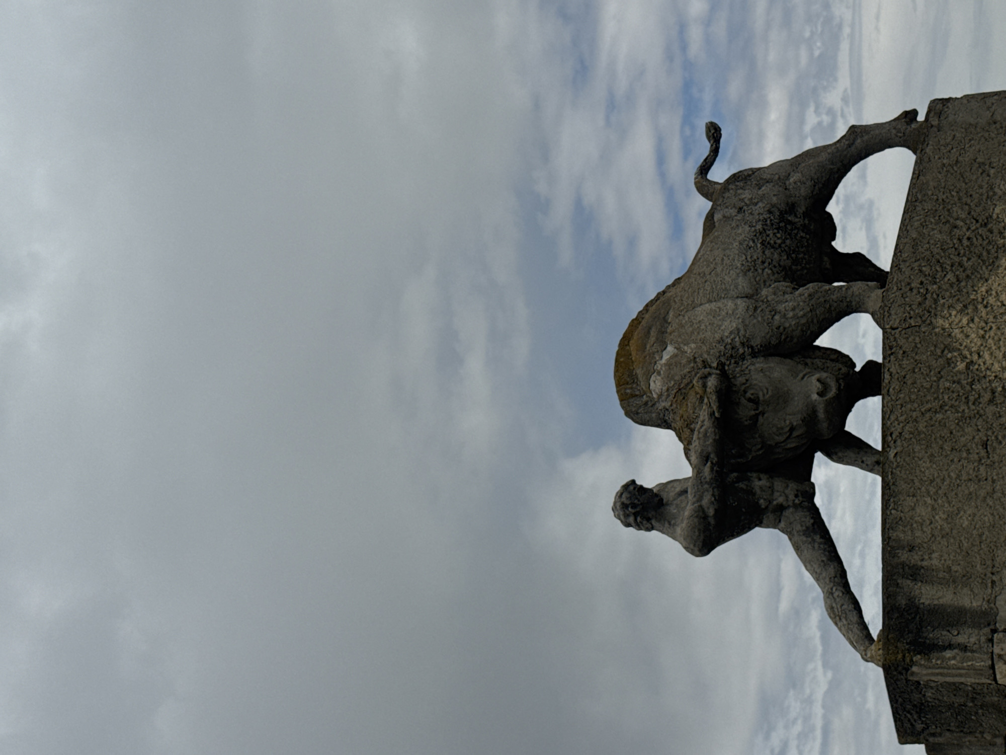 Stone bull-wrestling sculpture documented in Nagebi, Georgia