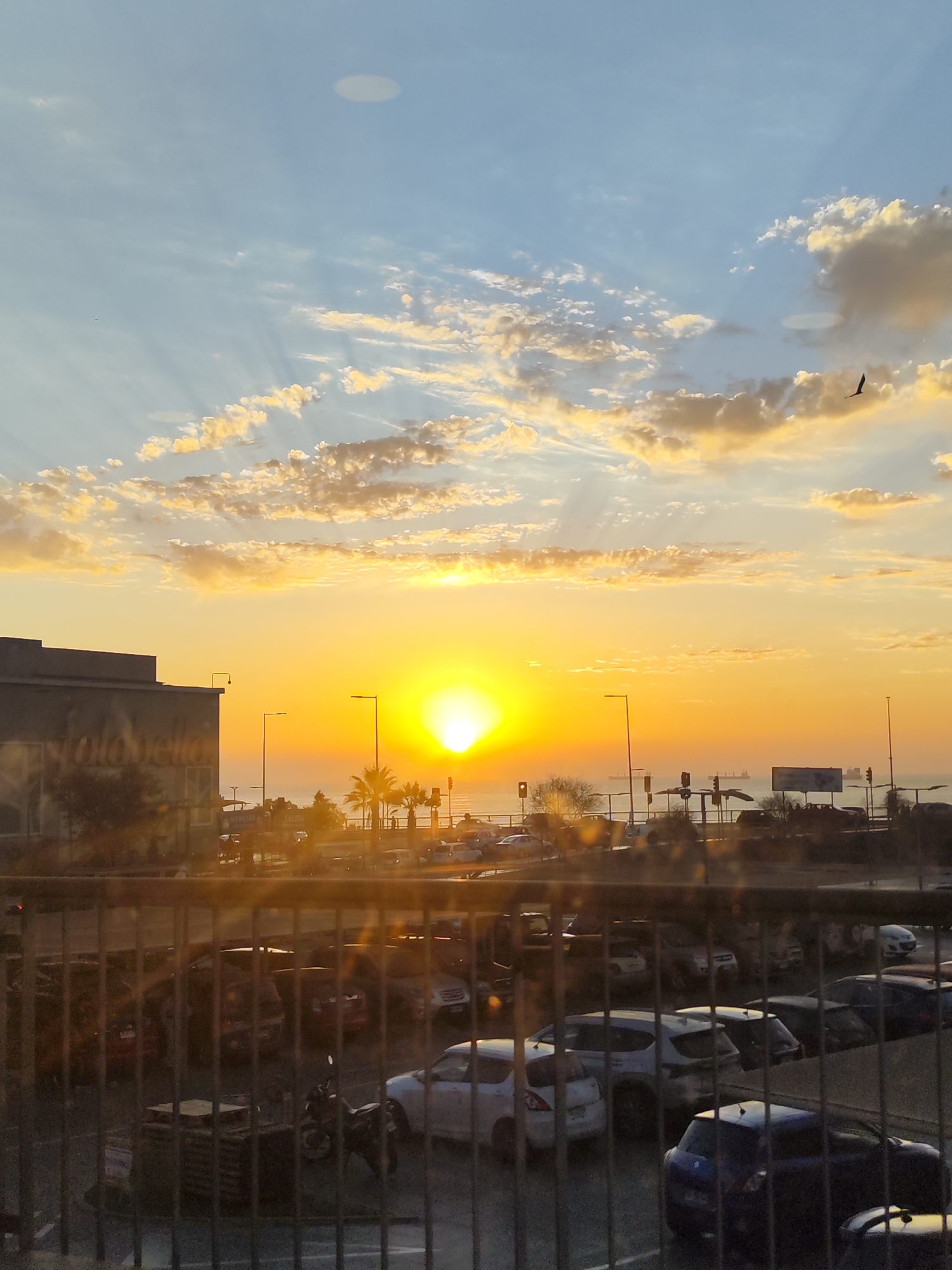 Sunrise and pizza delivery captured in Arica, Chile