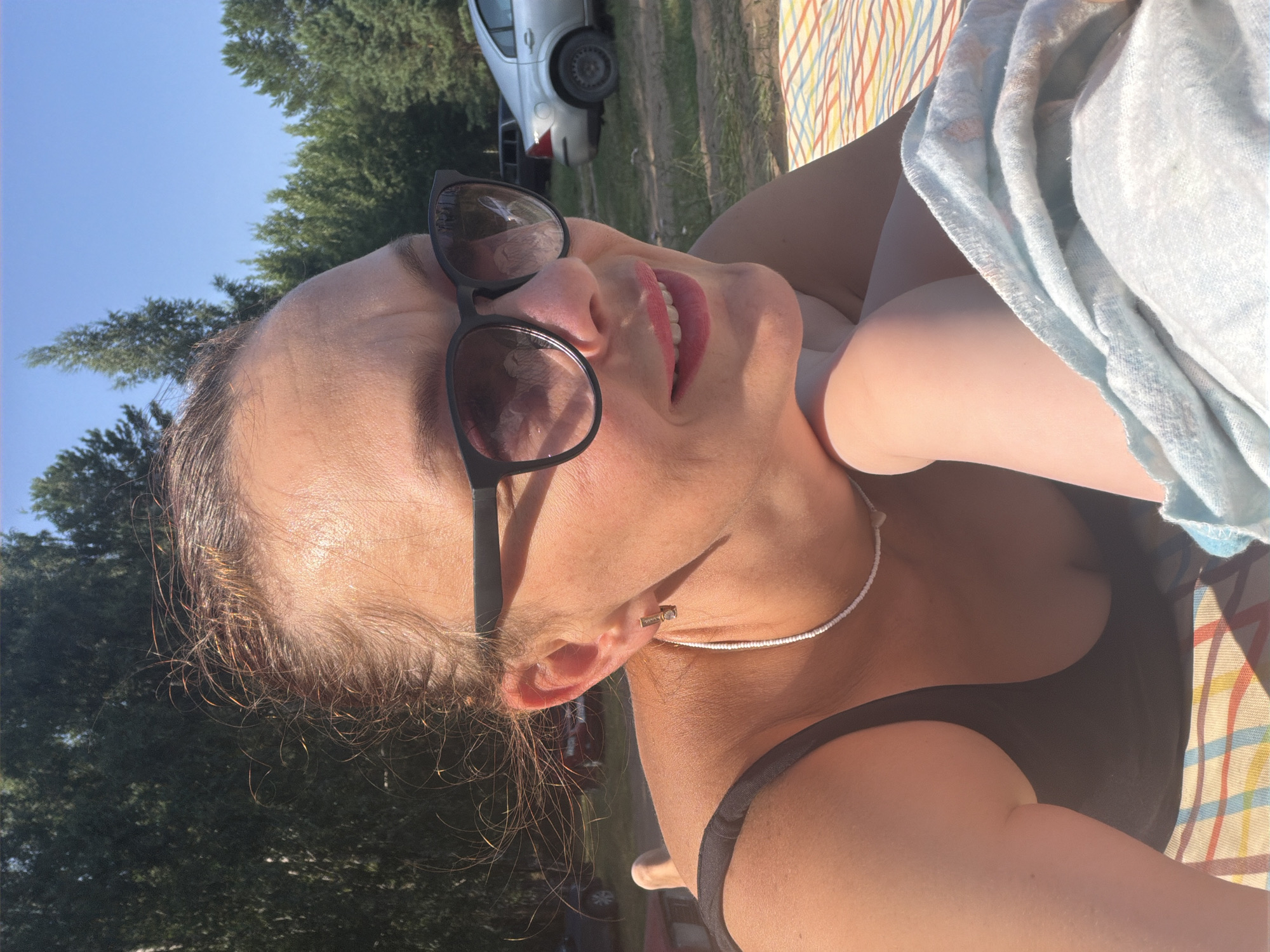 Lazy summer day at the water's edge in Noviy, Russia