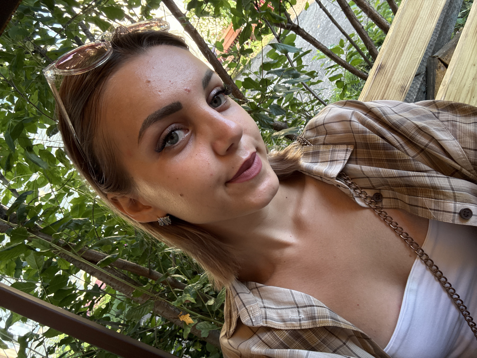 Selfie session in a Krasnogorskoye park, summer afternoon