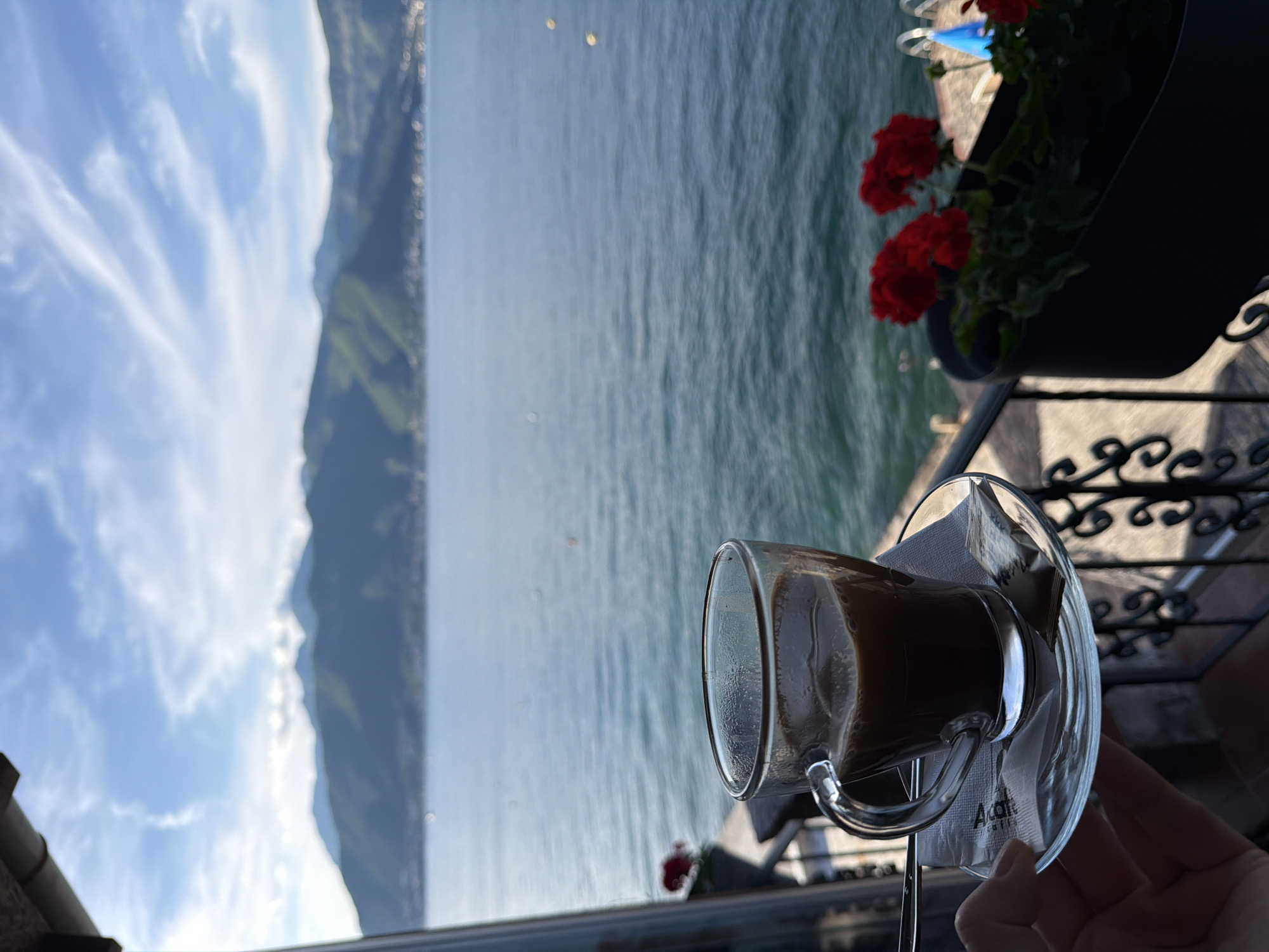 Coffee moment overlooking Montenegro's scenic waters and mountains