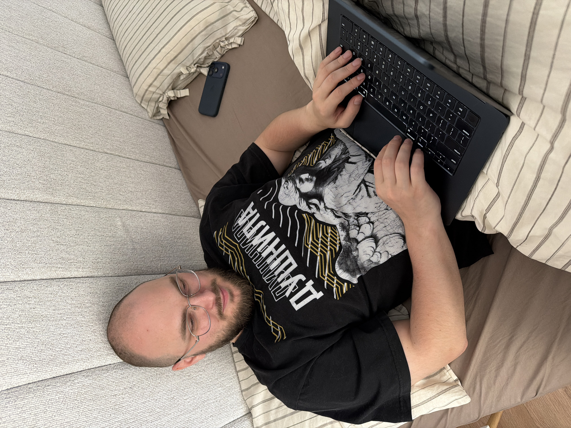 Man resting indoors captured in Tbilisi