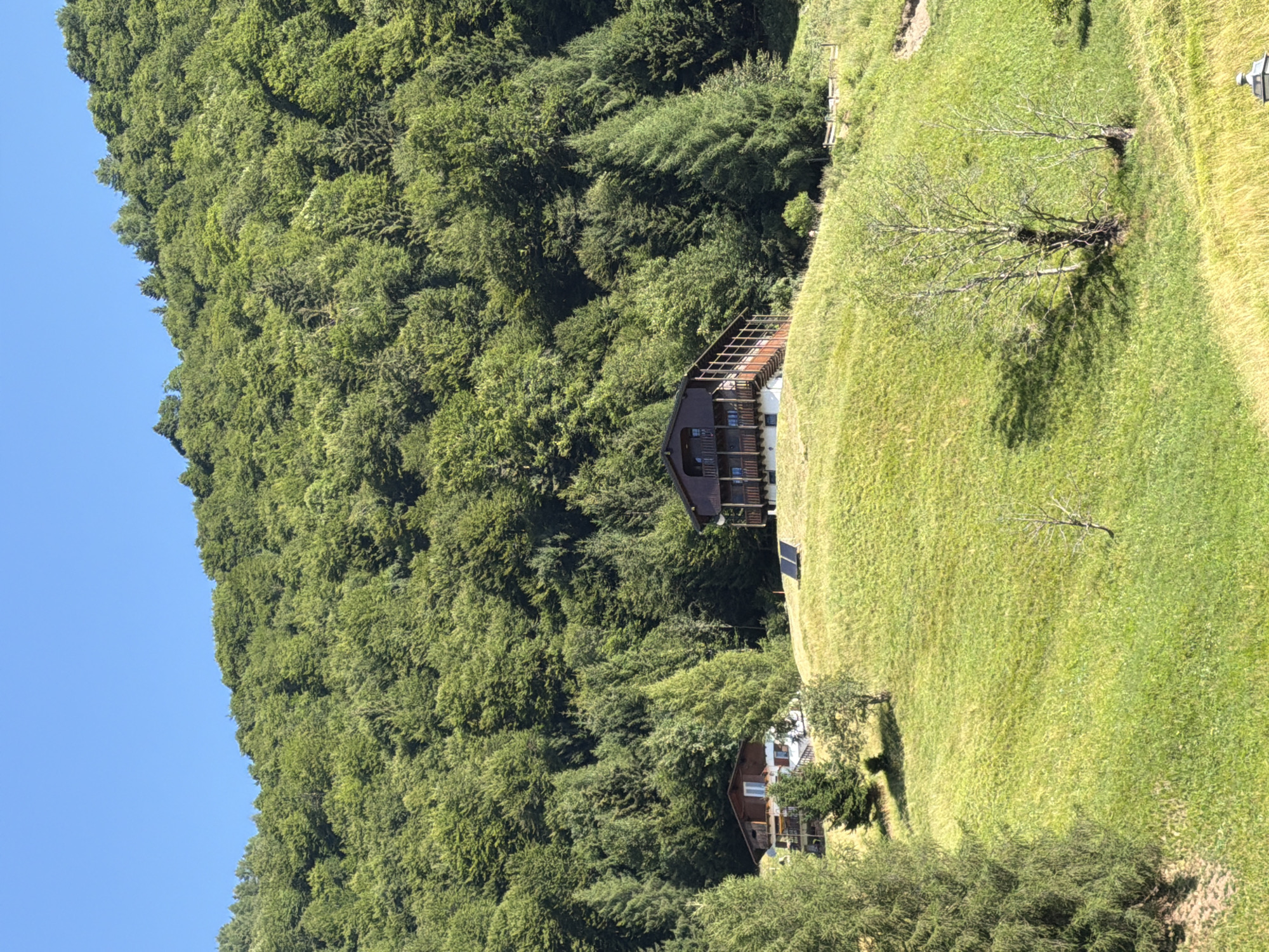 Summer morning details from a quiet Alpine village in Italy