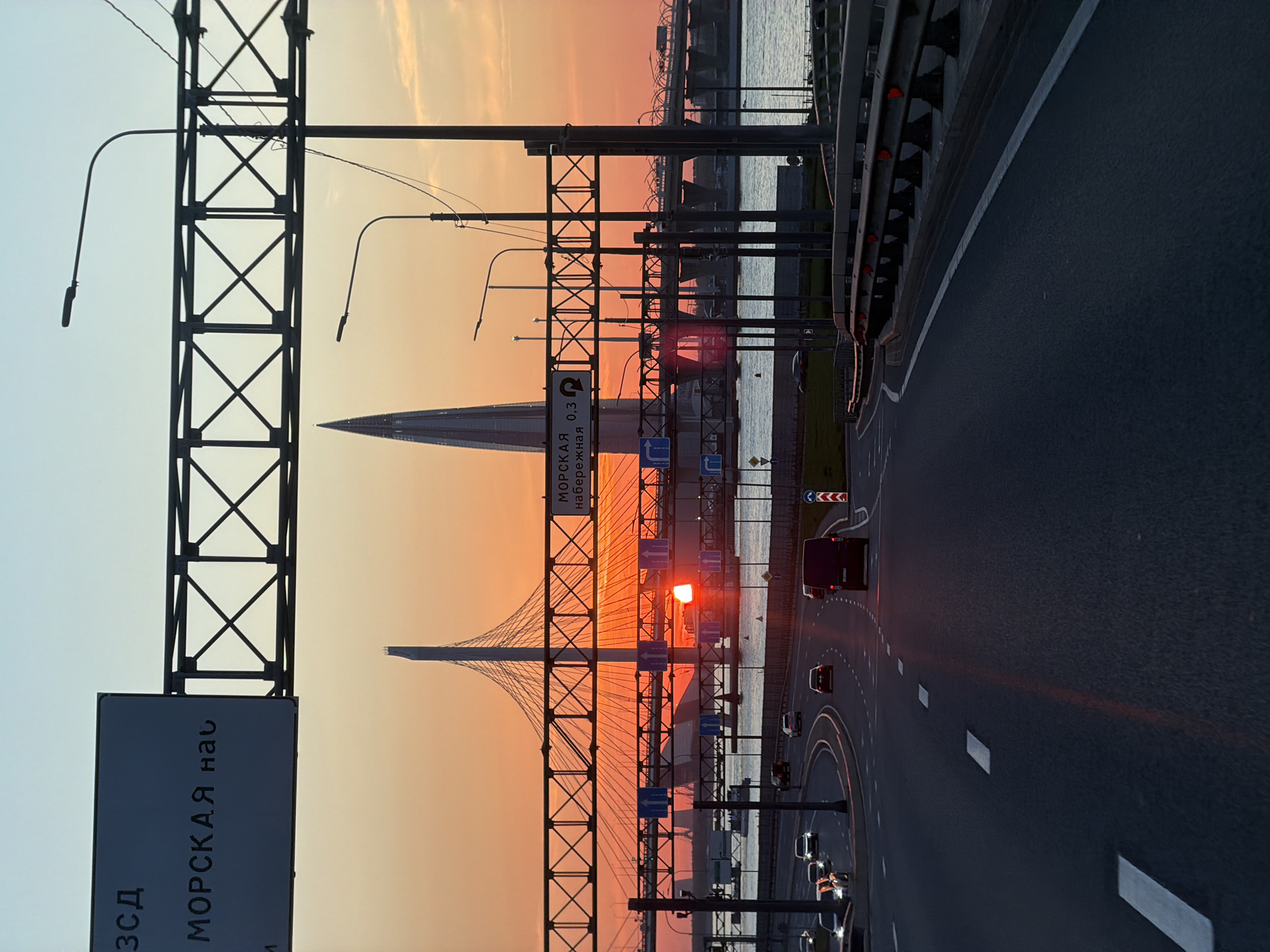 Sunset drive across Saint Petersburg bridge captures city skyline
