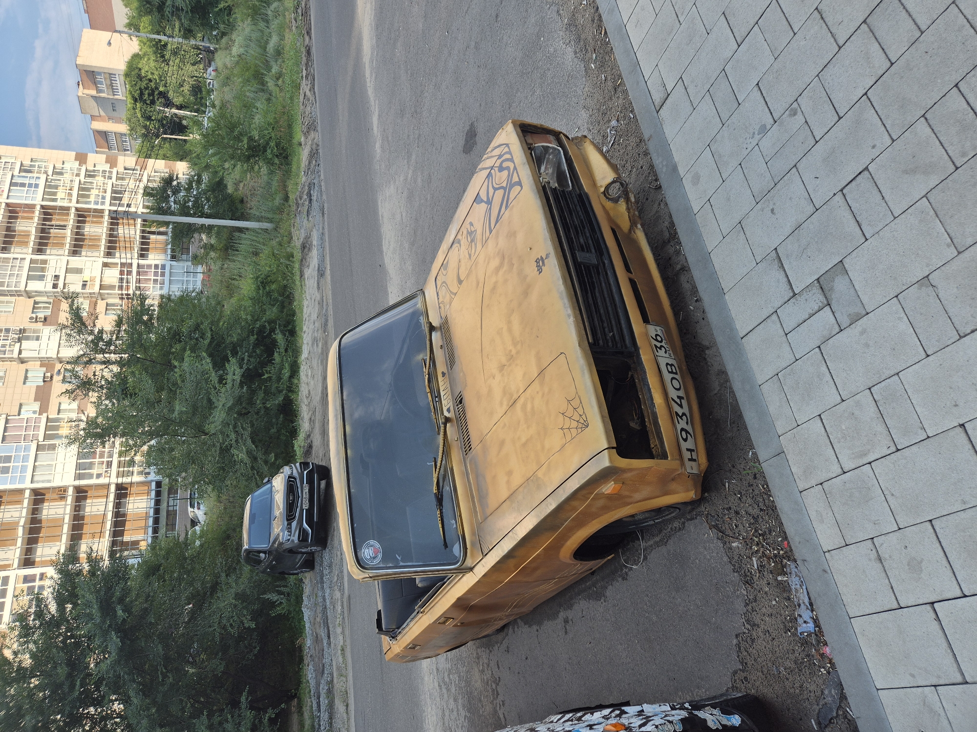 Two custom Lada convertibles parked on a Voronezh street