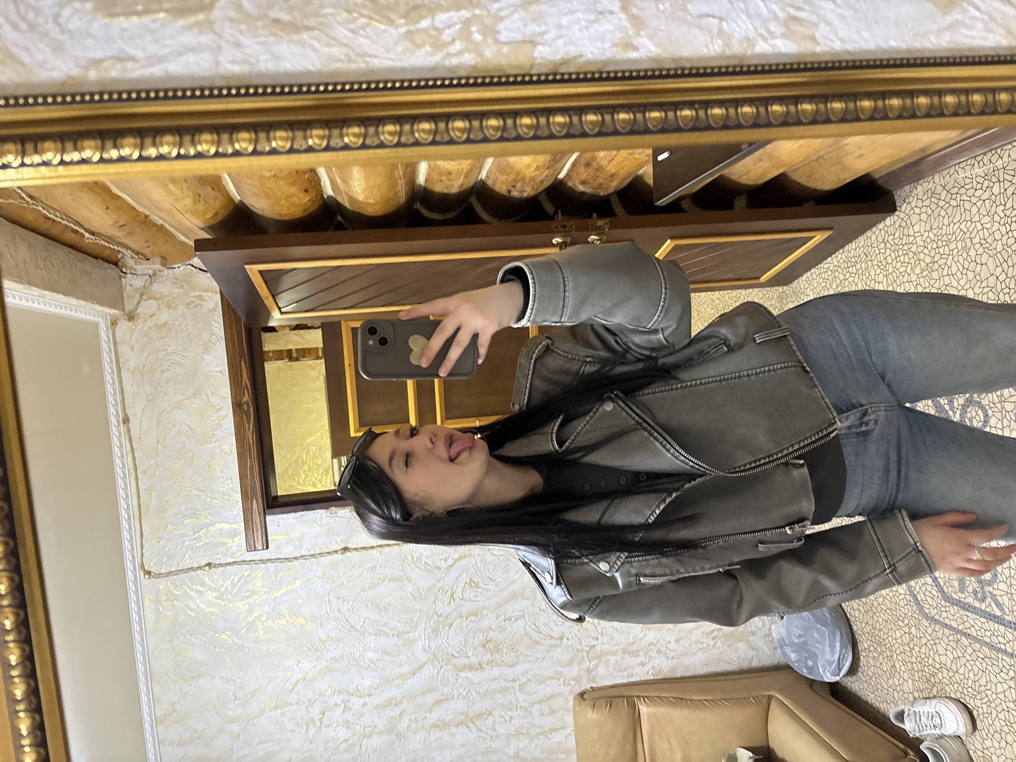 Woman records selfie content in Chaikovsky apartment