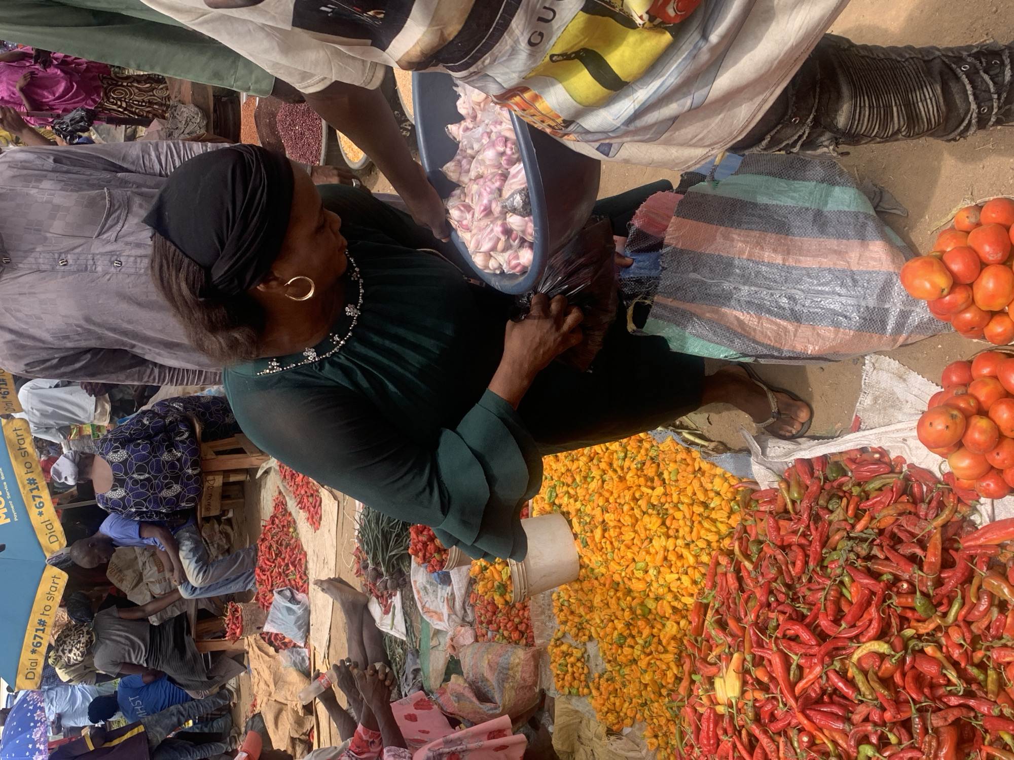 Routine market activity documented in Jos, Nigeria marketplace