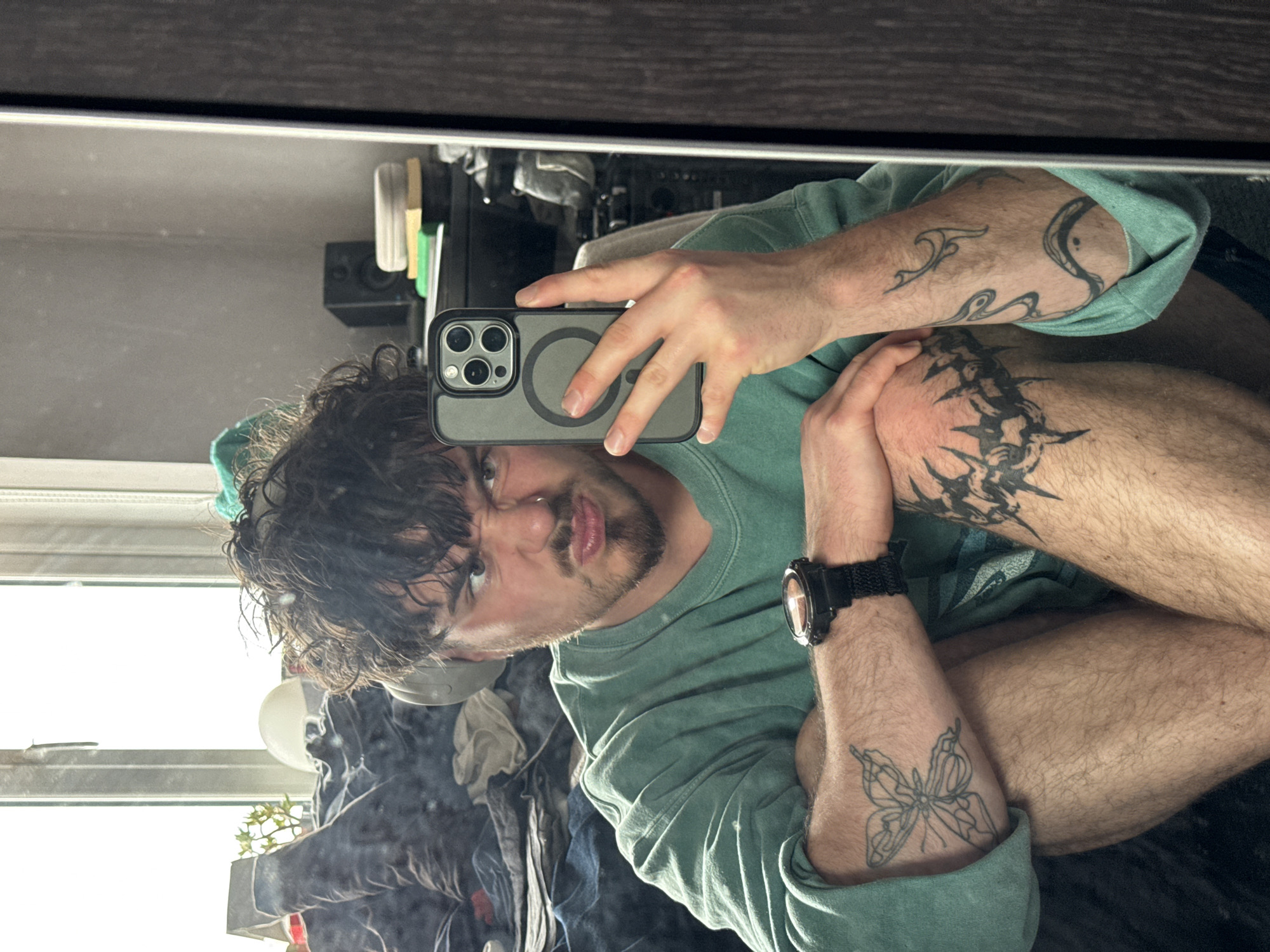 Casual moments captured: selfies, drinks, and scattered belongings