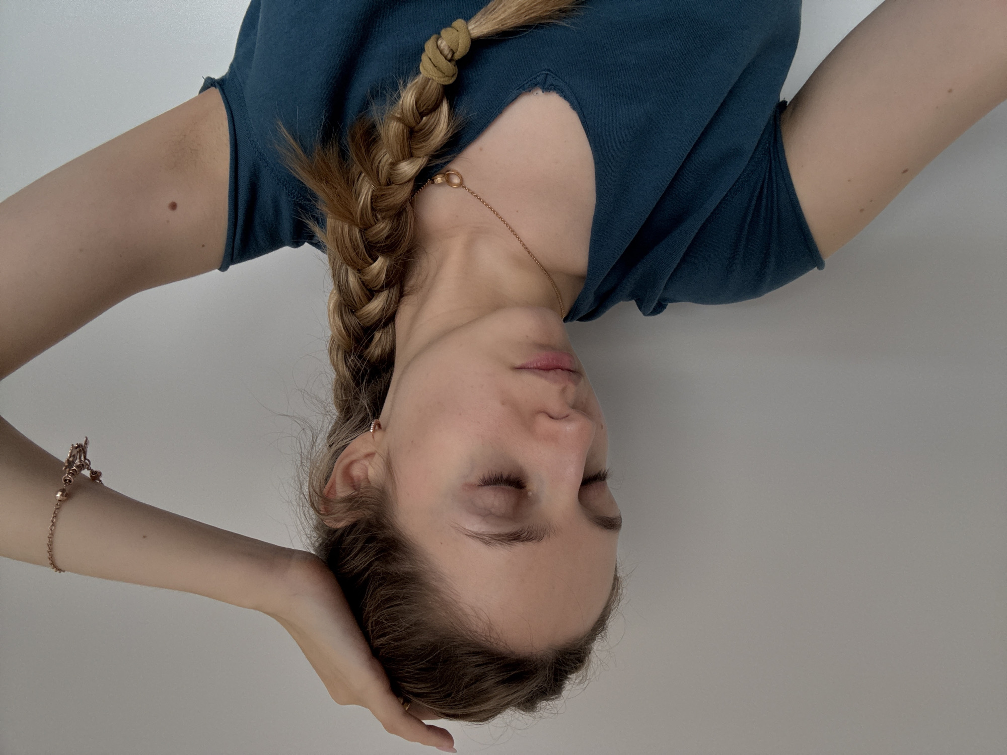 Young woman photographs indoor portrait session in Mexico City