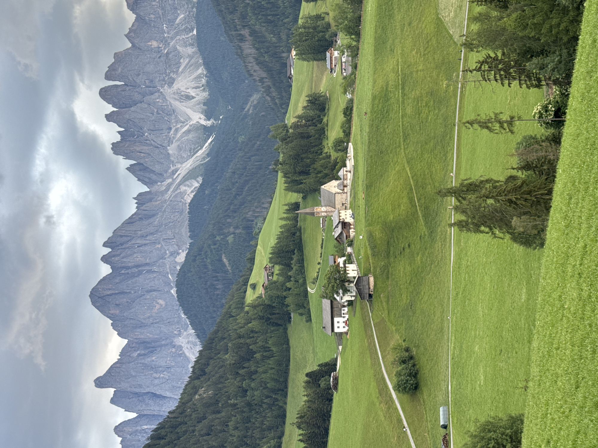 St. Magdalena village framed against the Dolomites, Val di Funes