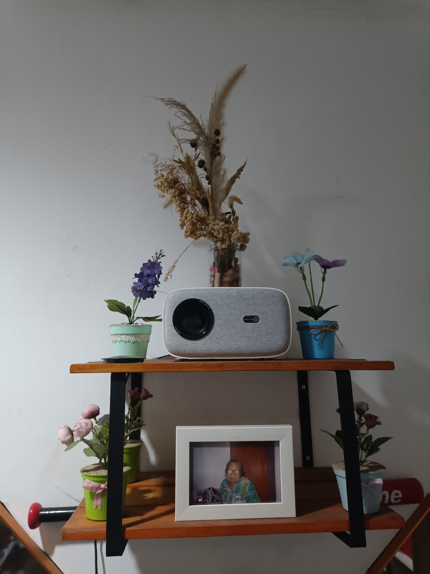 Eclectic West Jakarta home interior with décor, collectibles, and a baby