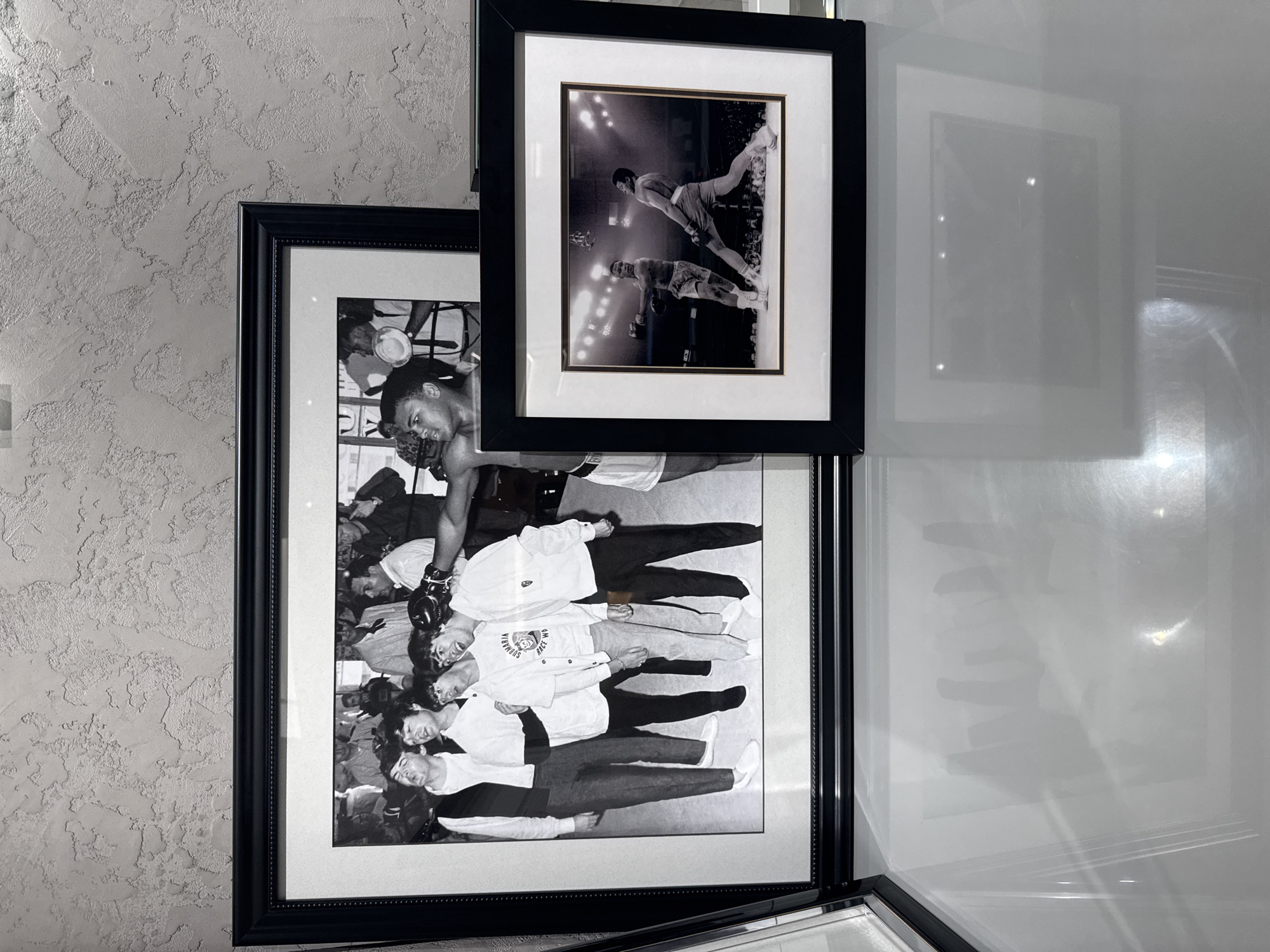 Black and white photographs displayed on Dubai wall