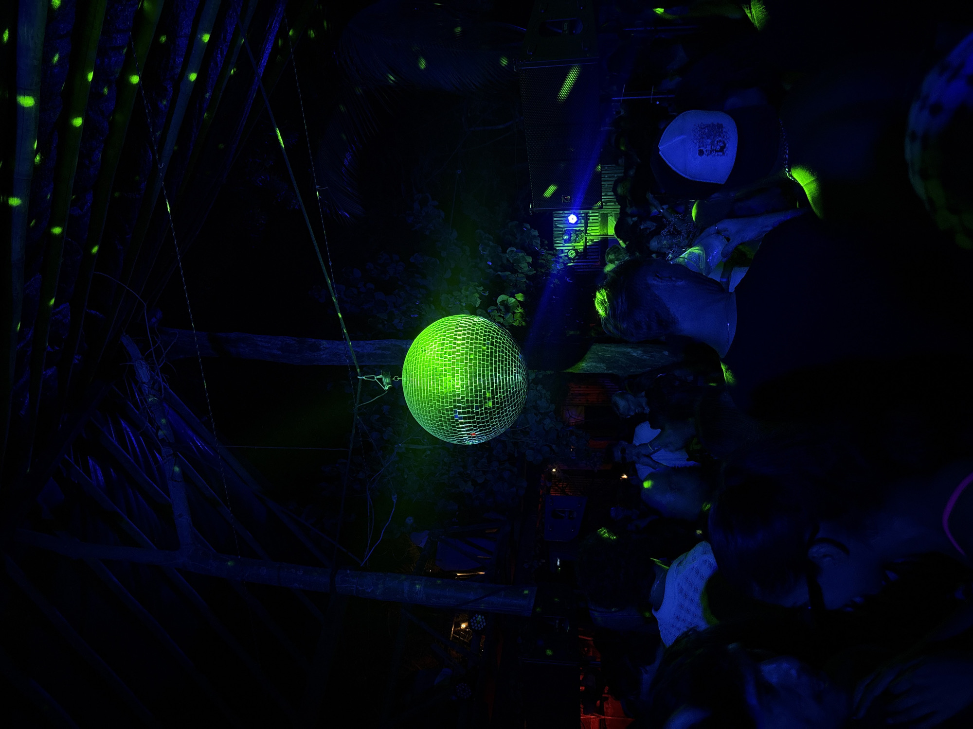 Outdoor night party with DJ and disco ball in Puerto Escondido