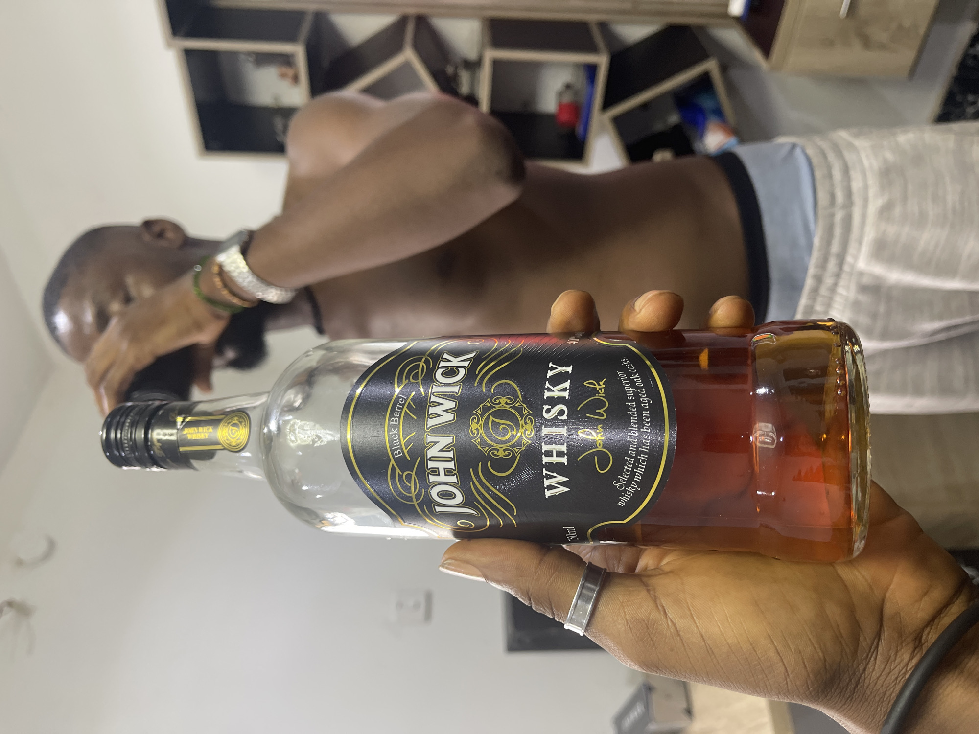 Indoor hangout in Abuja with drinks and dressed-up vibes