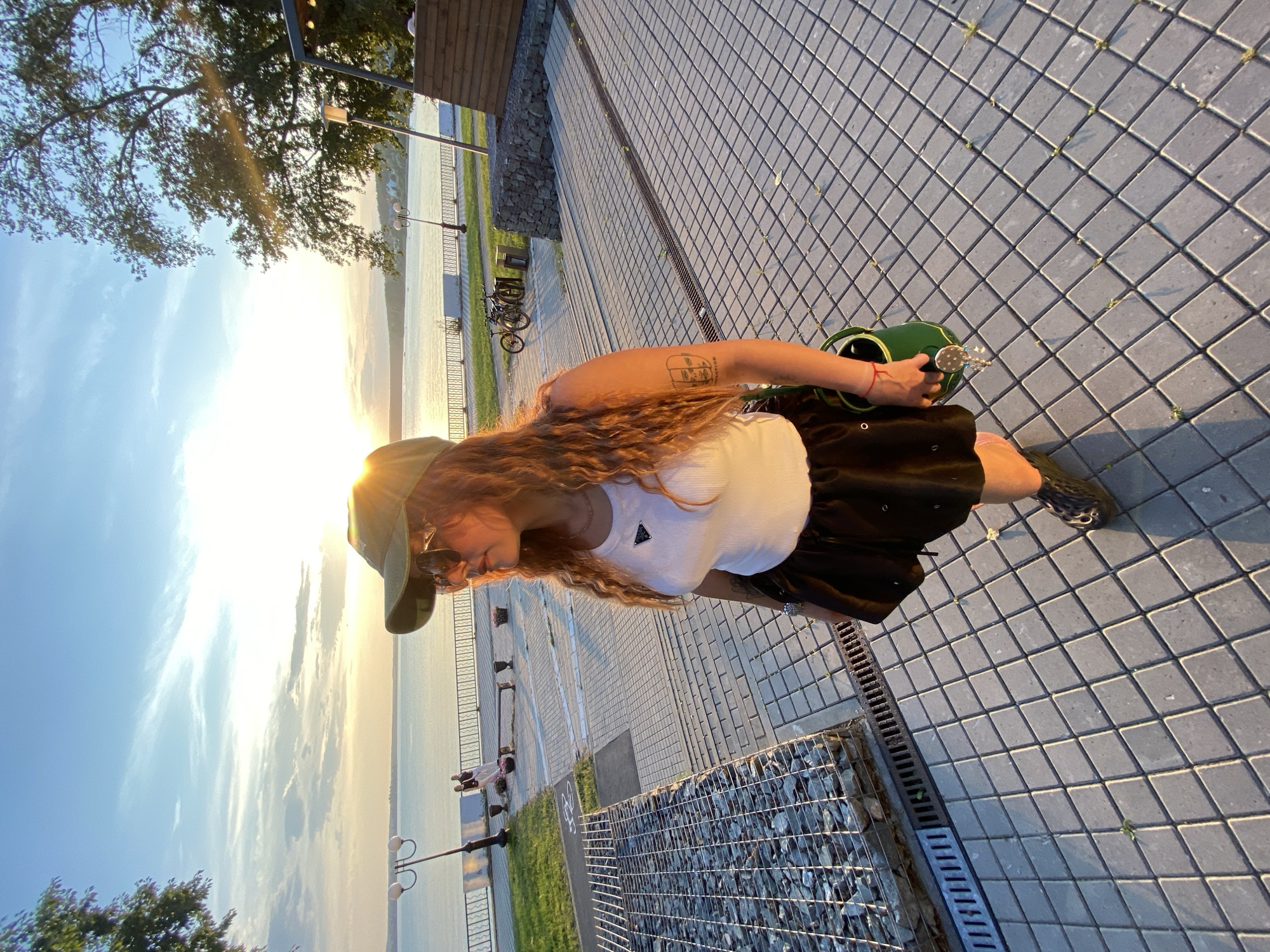 Summer evening at the Votkinsk waterfront, flute player and lake views
