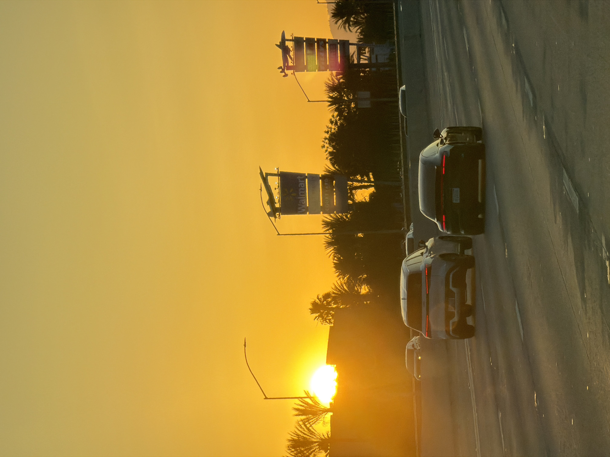 Evening traffic observed on Burbank road during sunset