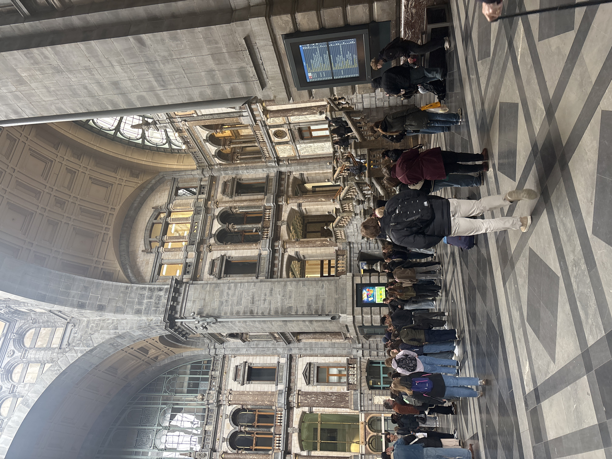 Long queue forms inside Antwerp Central Station