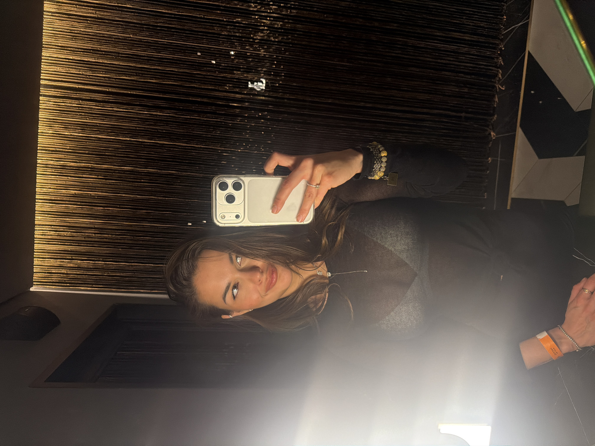 Woman takes selfie in interior space in Krasnoyarsk