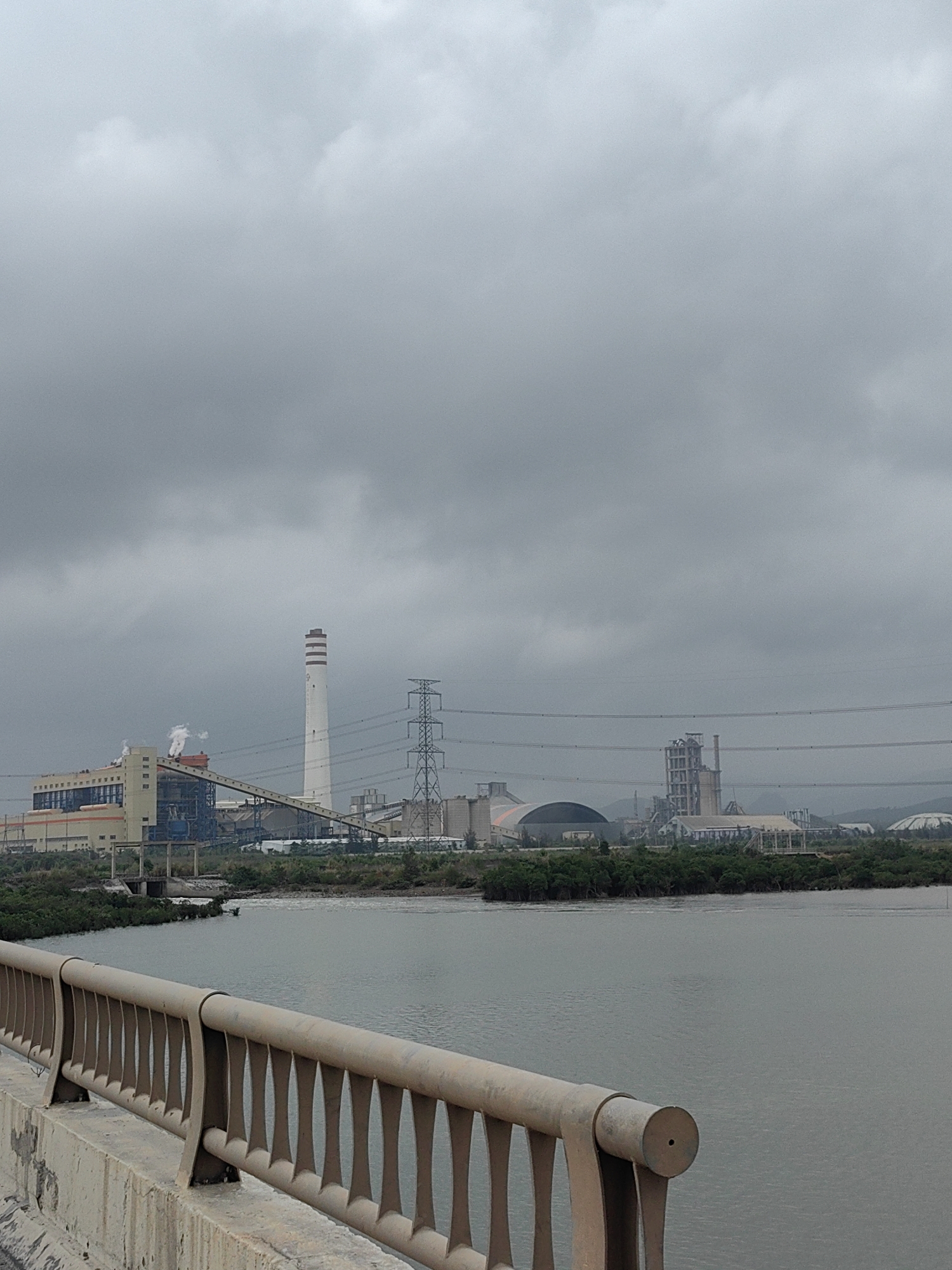 Overcast morning view of industrial area from Vietnamese bridge