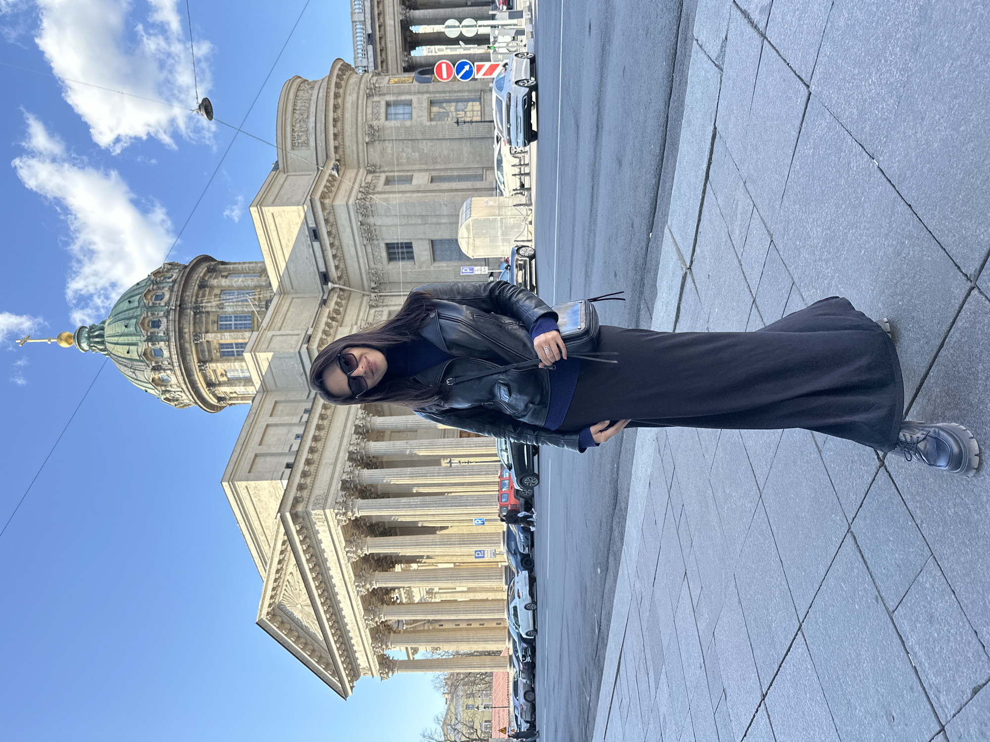 Tourists visit Kazan Cathedral on sunny afternoon in Saint Petersburg