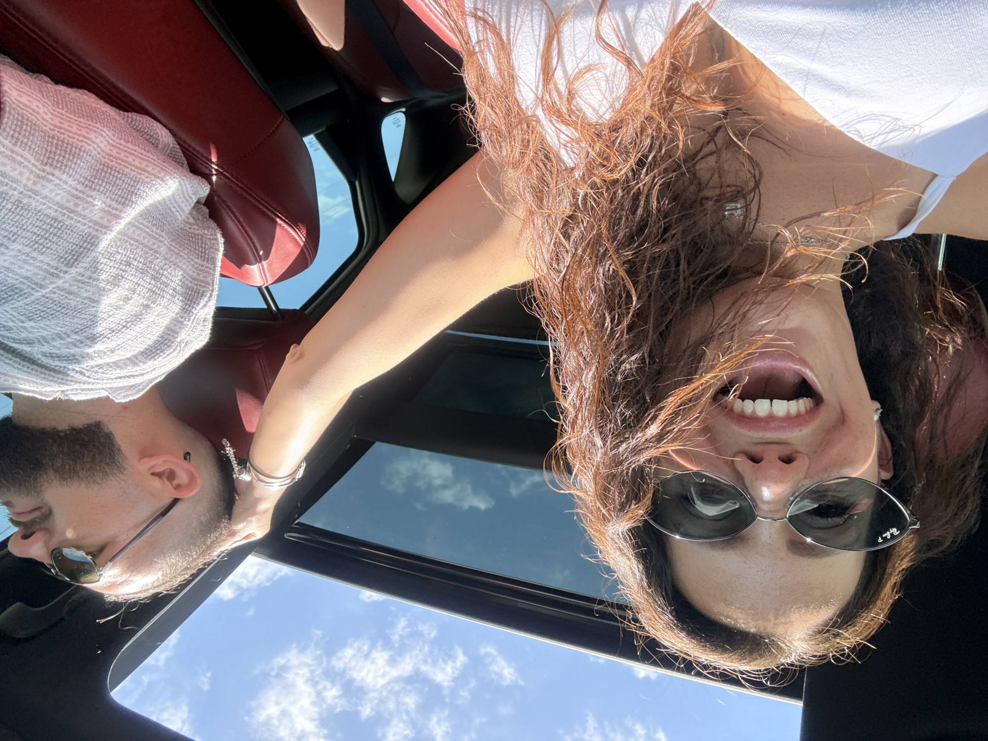 Couple spotted through sunroof in Marathon Florida daylight scene