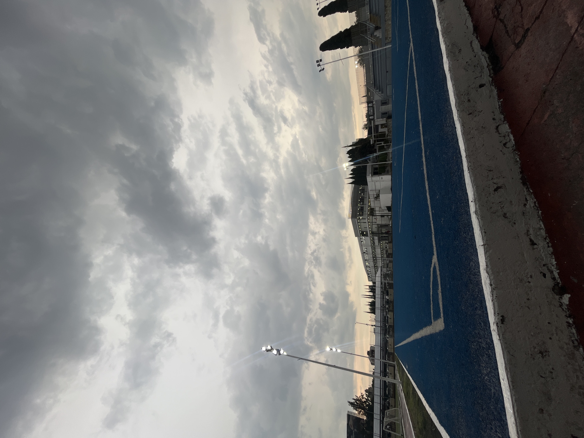 Athletic activities documented at track and gym facility