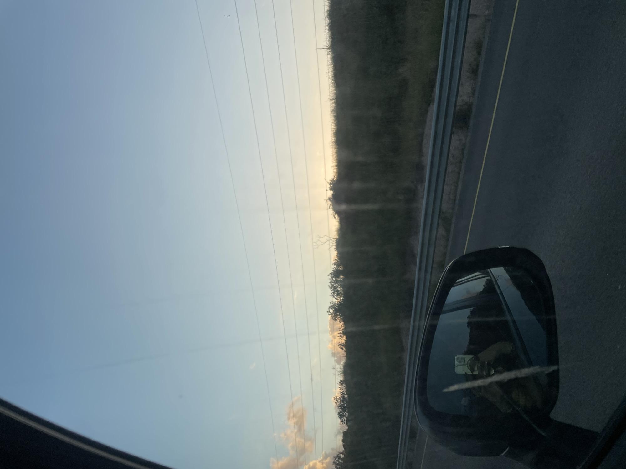 Vehicle journey through Givat Hen captures roadside scenery
