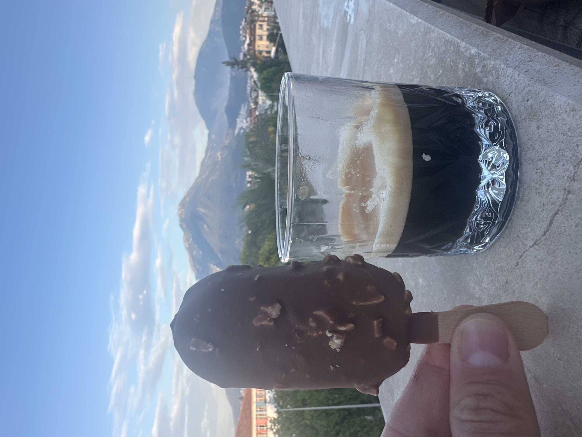 Person enjoys ice cream with espresso in Fethiye, Turkey