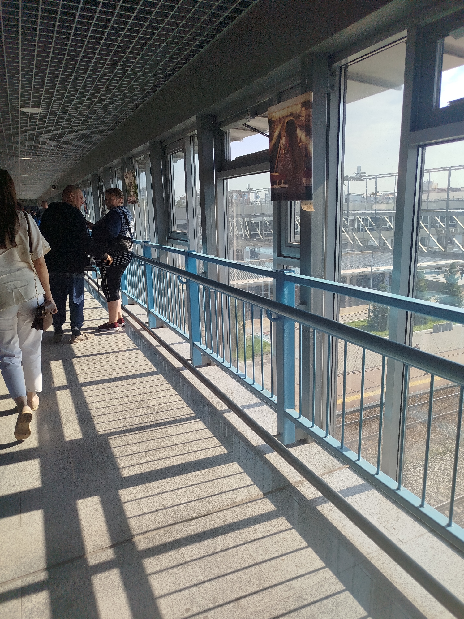 Tyumen railway station buzzing with activity and a military presence