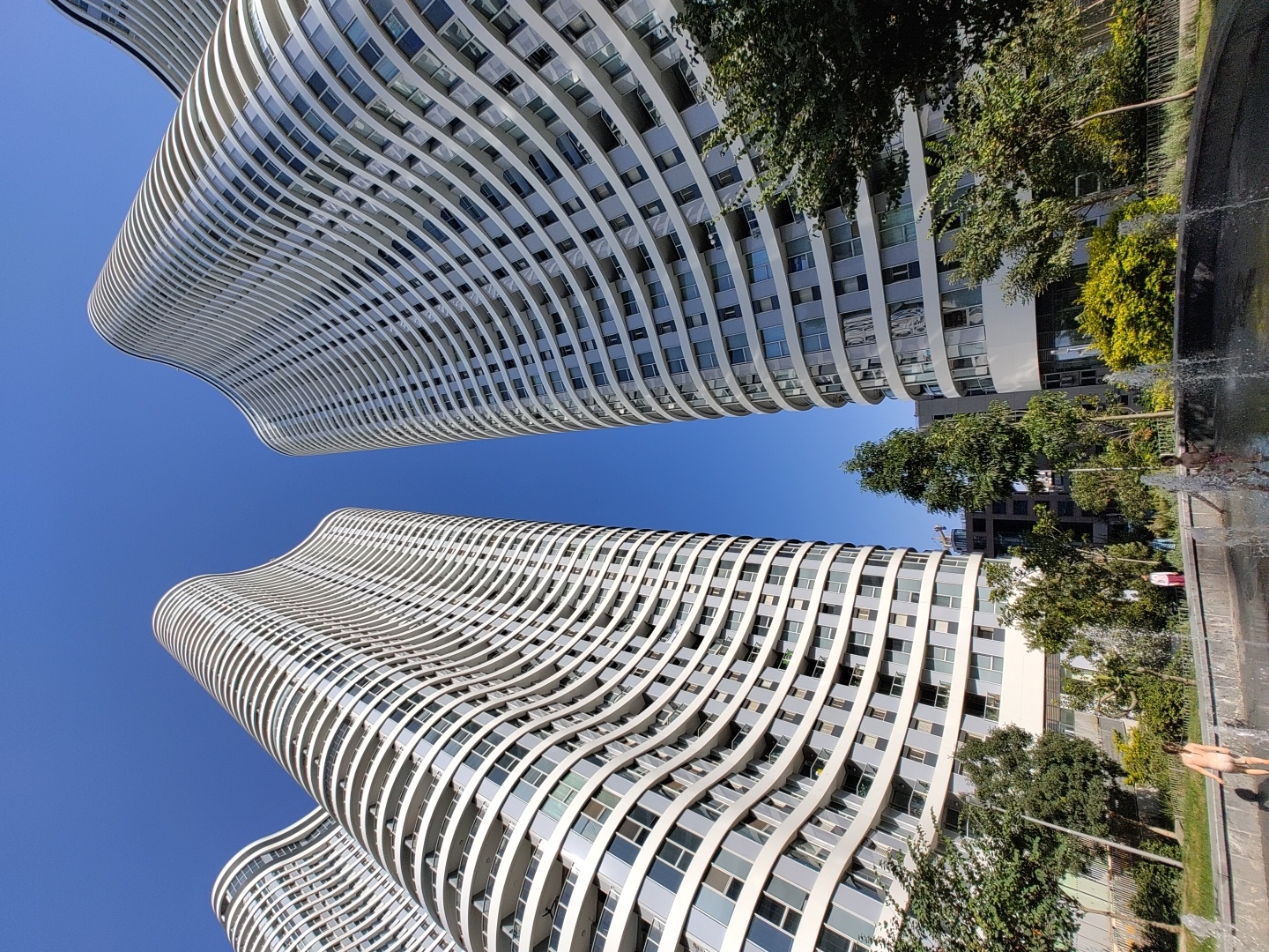 Tel Aviv's curving white towers and the park below