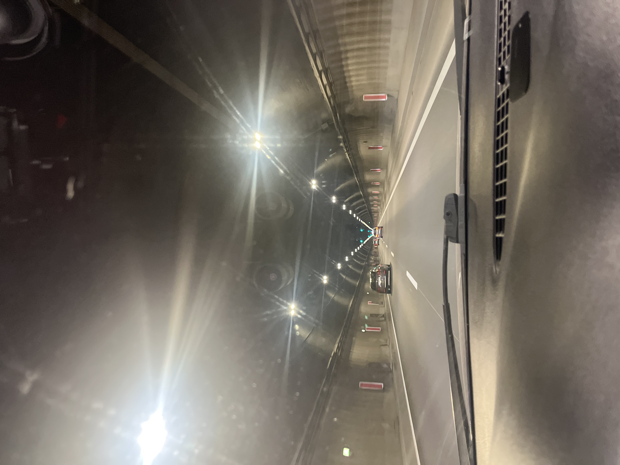 Underground tunnel with vehicles observed by witness
