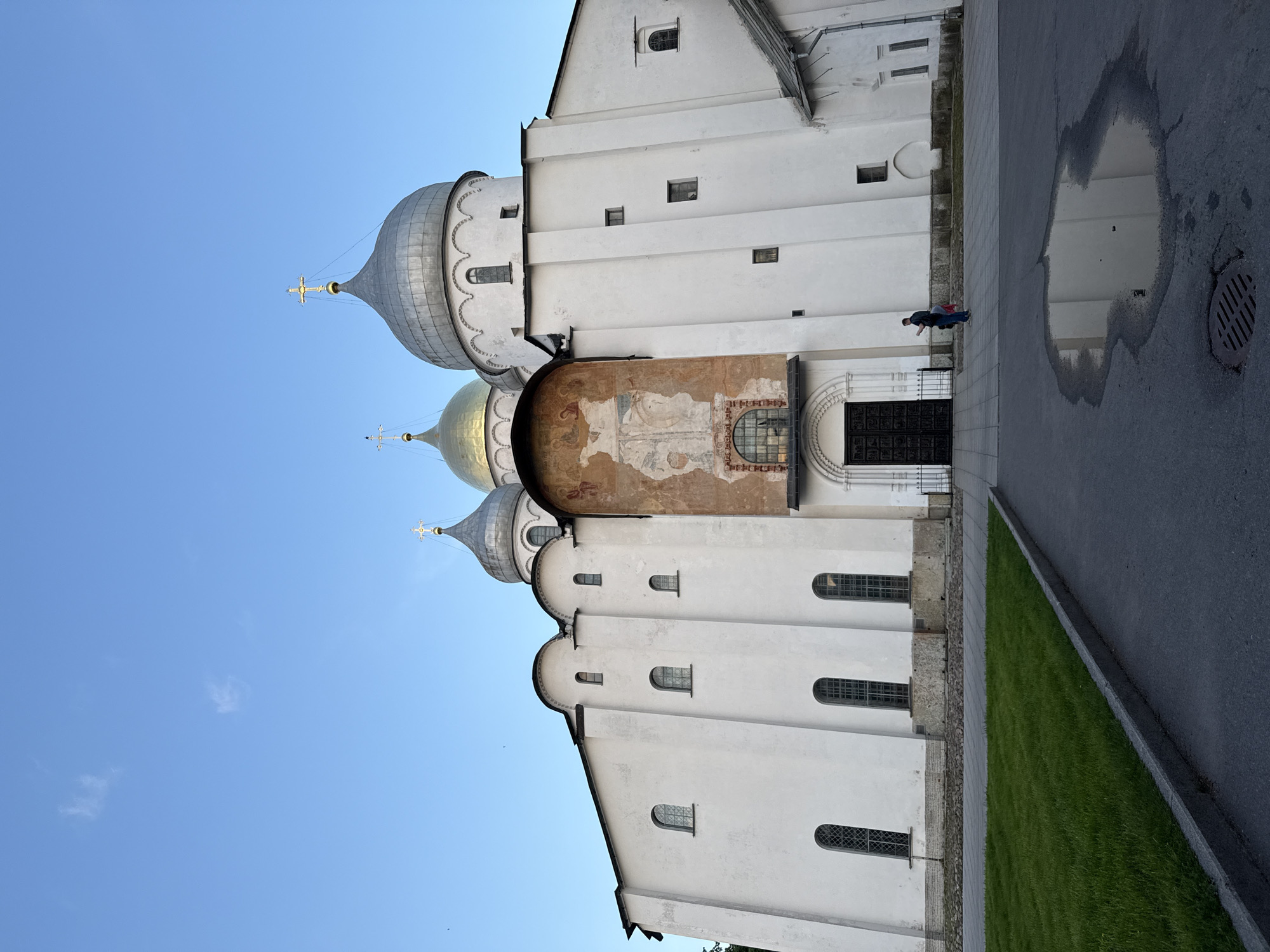 Evening visitors explore historic Veliky Novgorod kremlin landmarks
