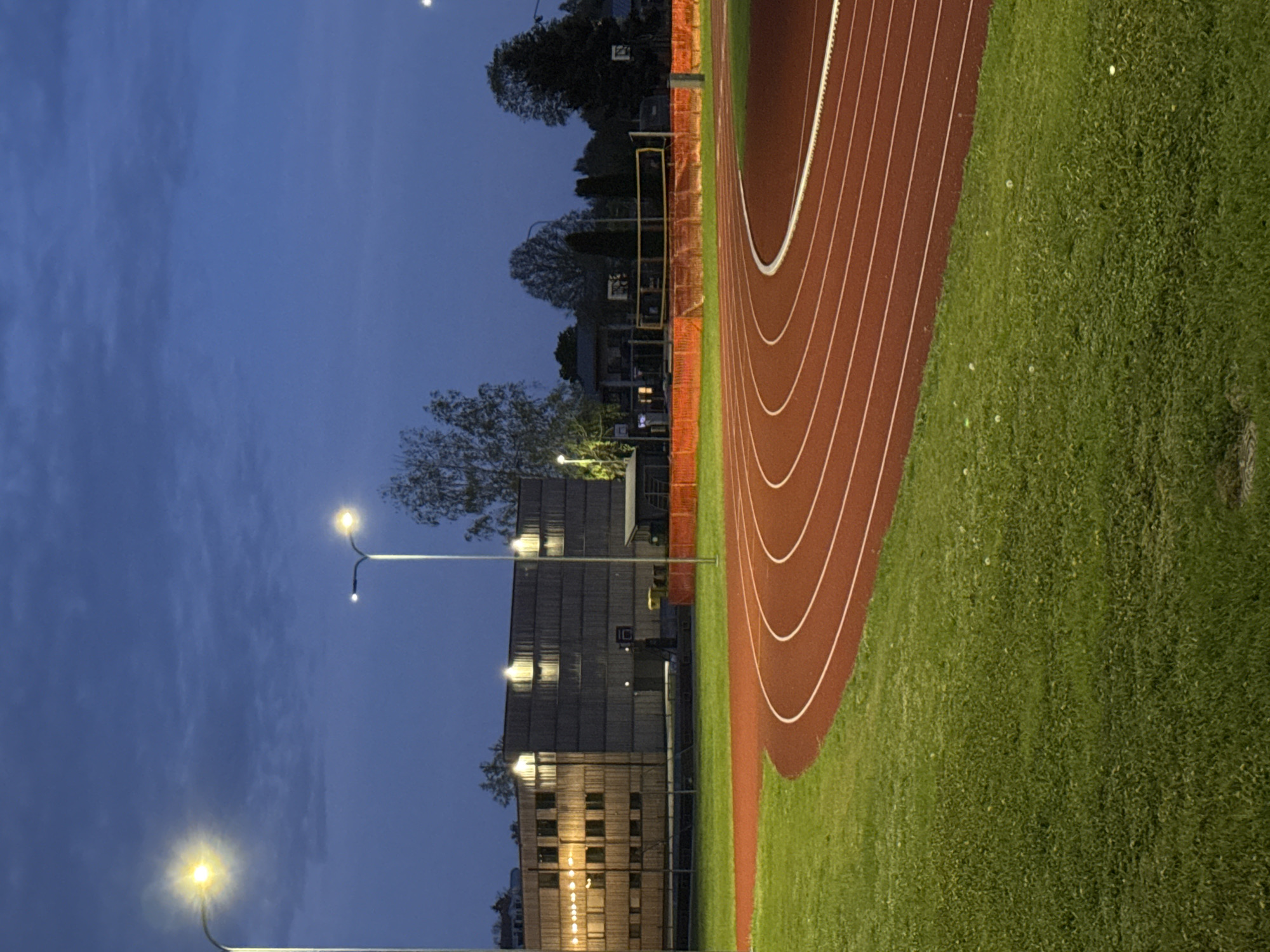 Evening view of illuminated running track in Carnikava, Latvia
