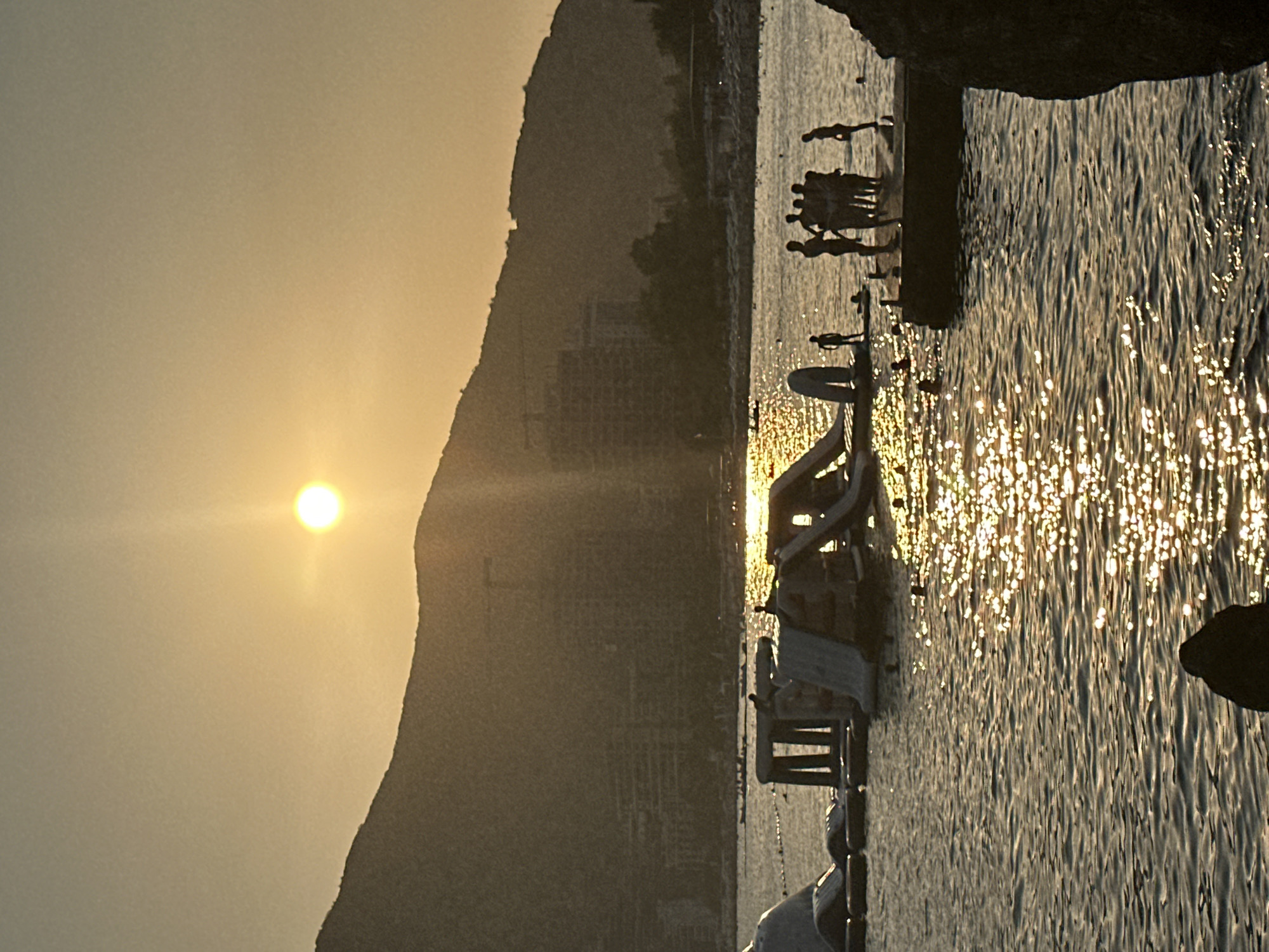 Budva beach at sunset, Adriatic glow and waterfront crowds