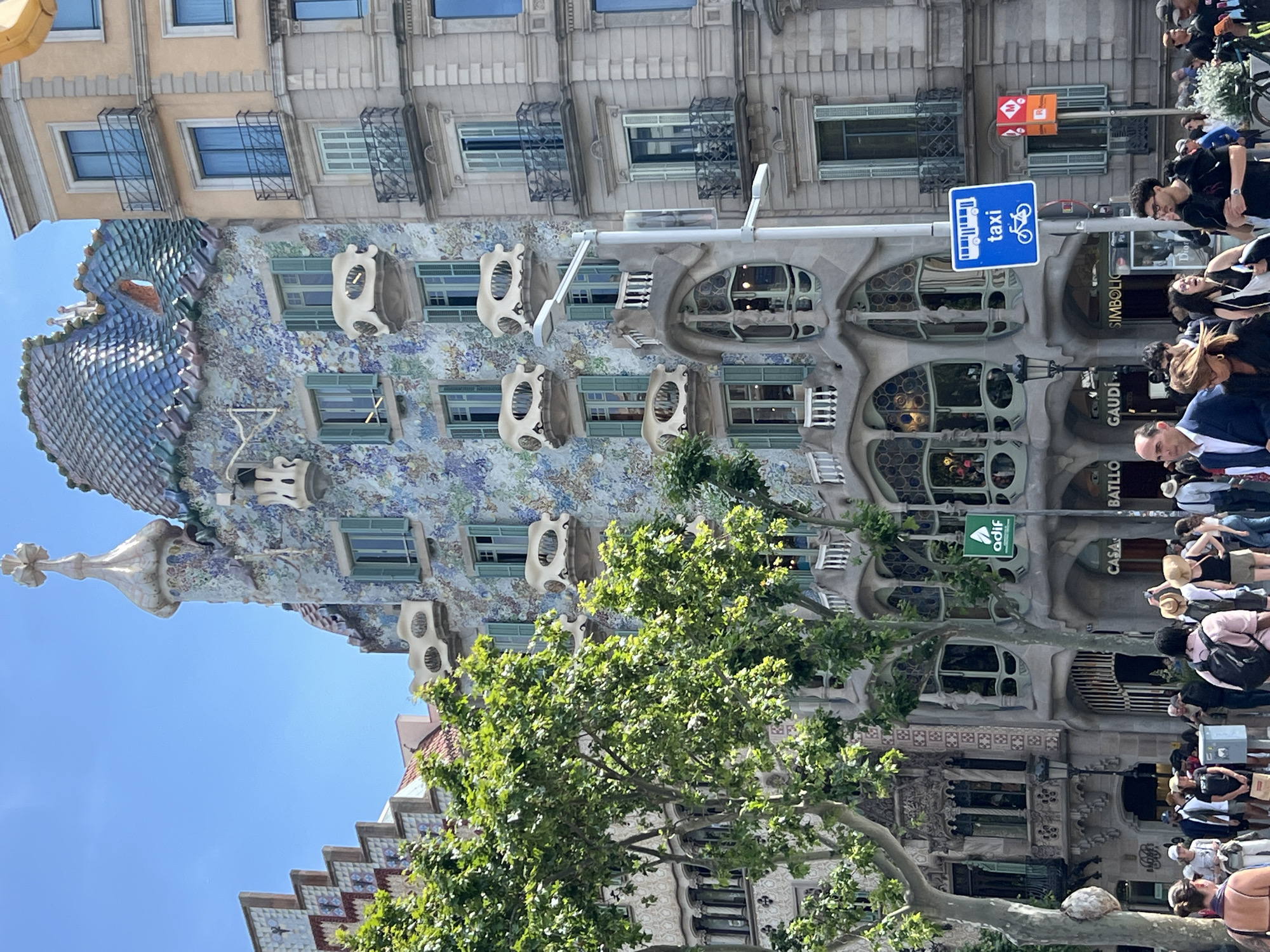 Tourist captures Gaudí's Casa Batlló facade in Barcelona