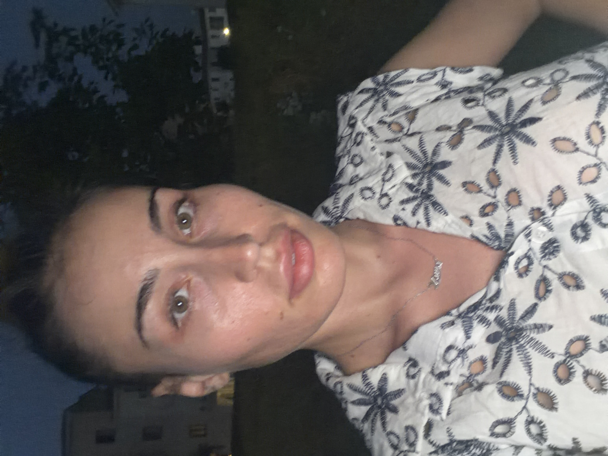 Woman documents evening stroll through Tersefanou, Cyprus at twilight