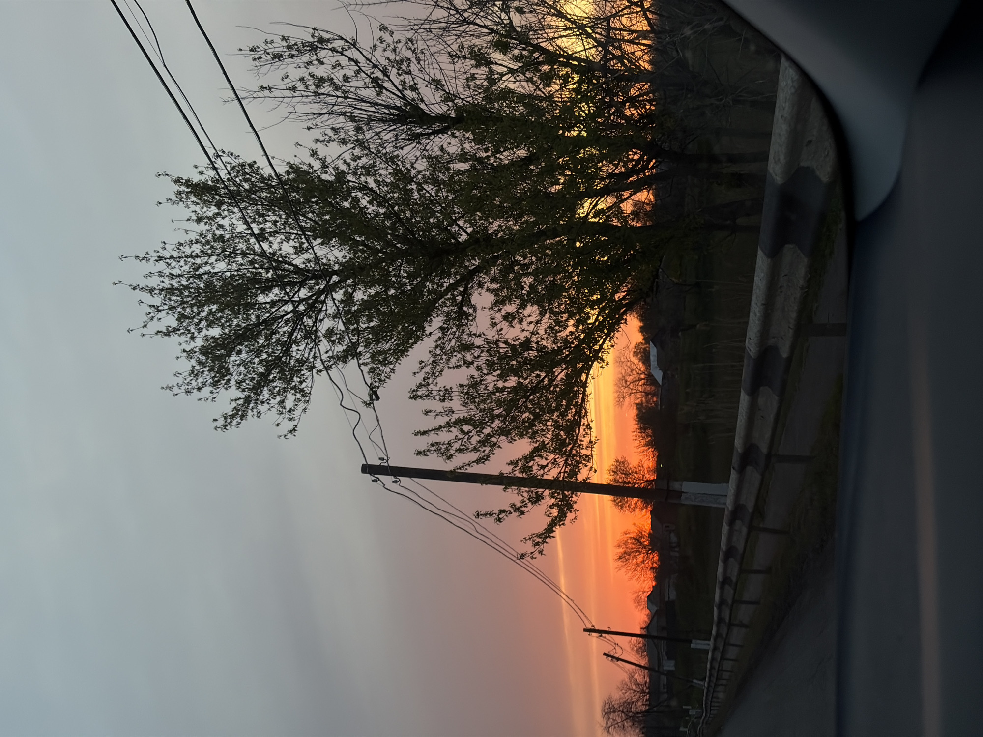 Sunset observed from vehicle roadside in Alexandrovka, Russia