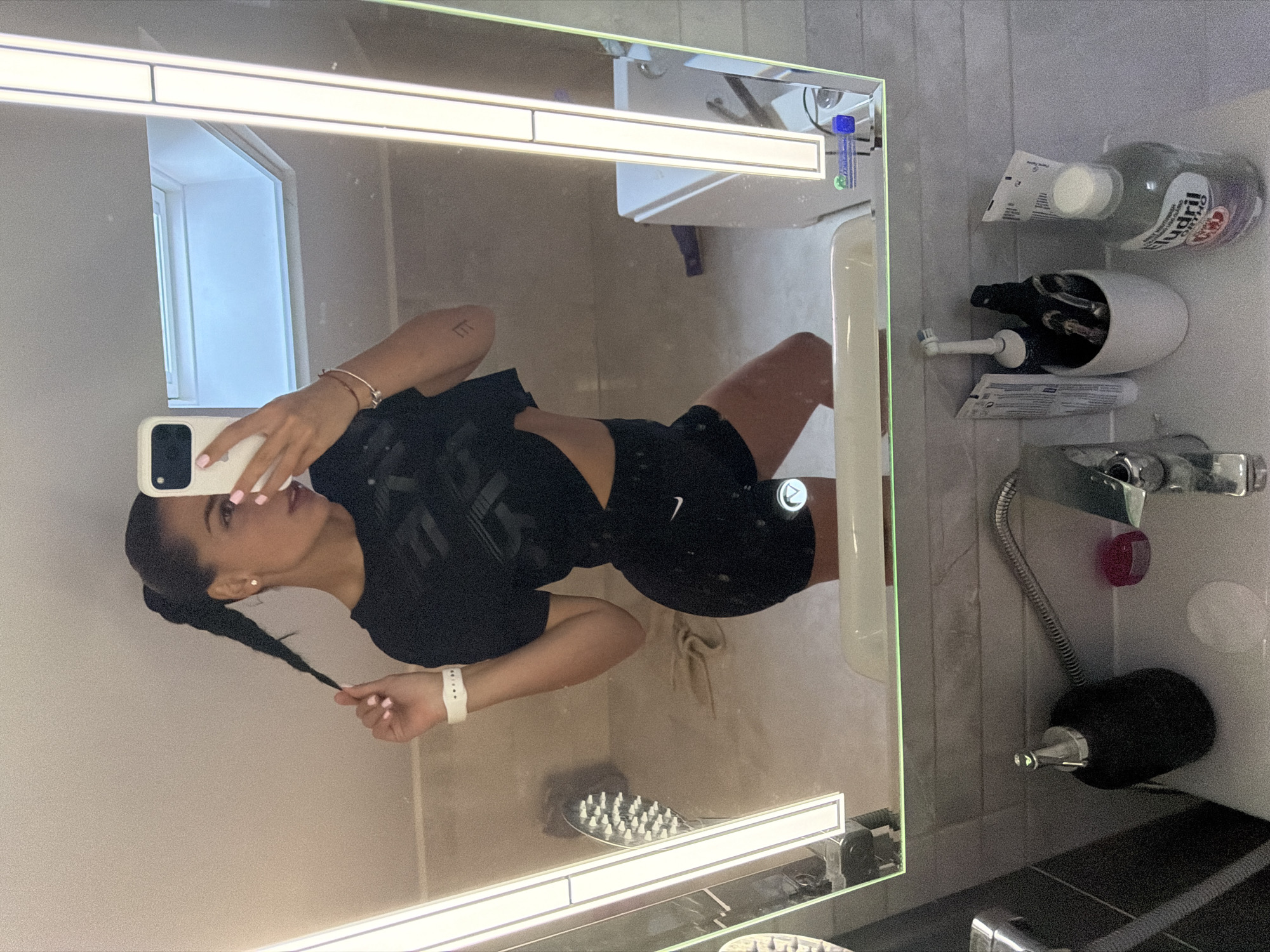 Mirror selfie in a Gabrovo bathroom, black athletic outfit