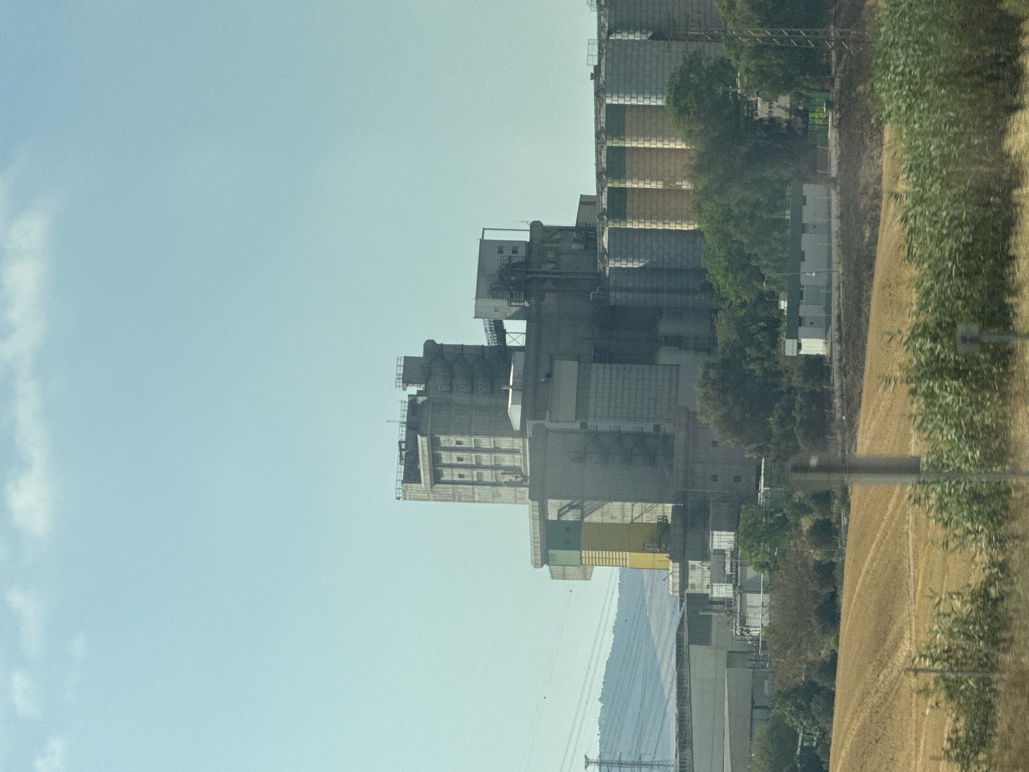 Industrial complex with concrete silos documented in Bnei Shimon