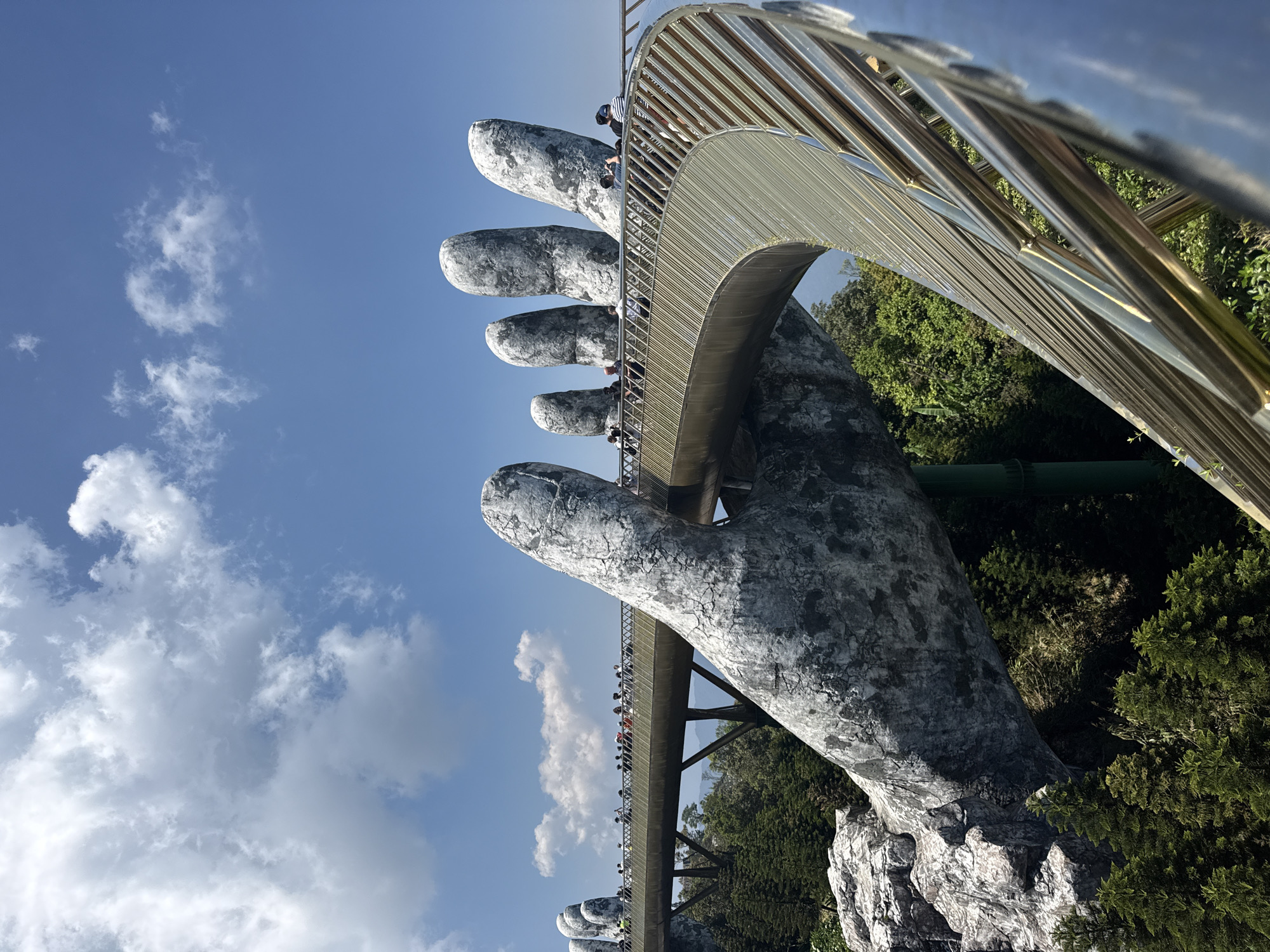 Tourists photograph iconic Golden Bridge at Vietnam's Bà Nà Hills