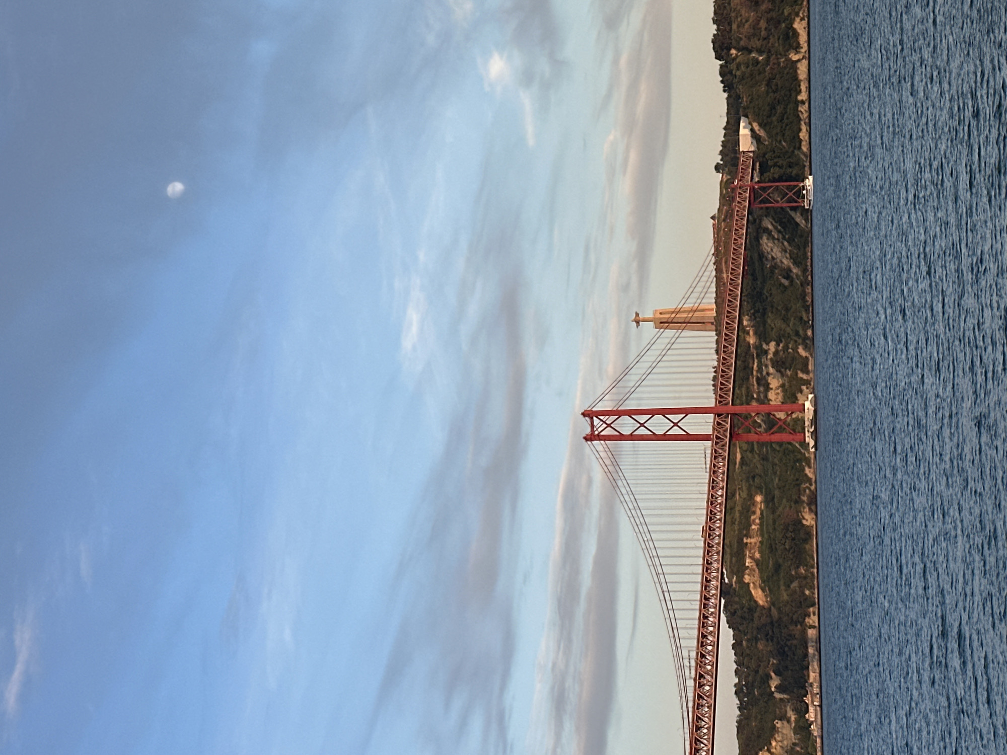 25 de Abril Bridge at dusk over the Tagus River