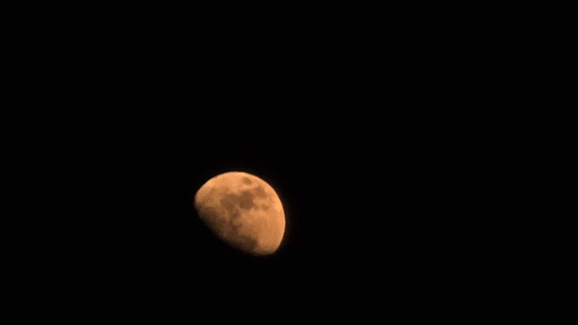 Crescent moon rises over Krasnodar on a summer night