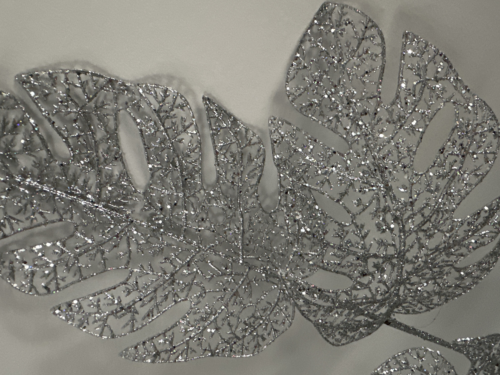 Floral arrangements and glittery decorative details up close