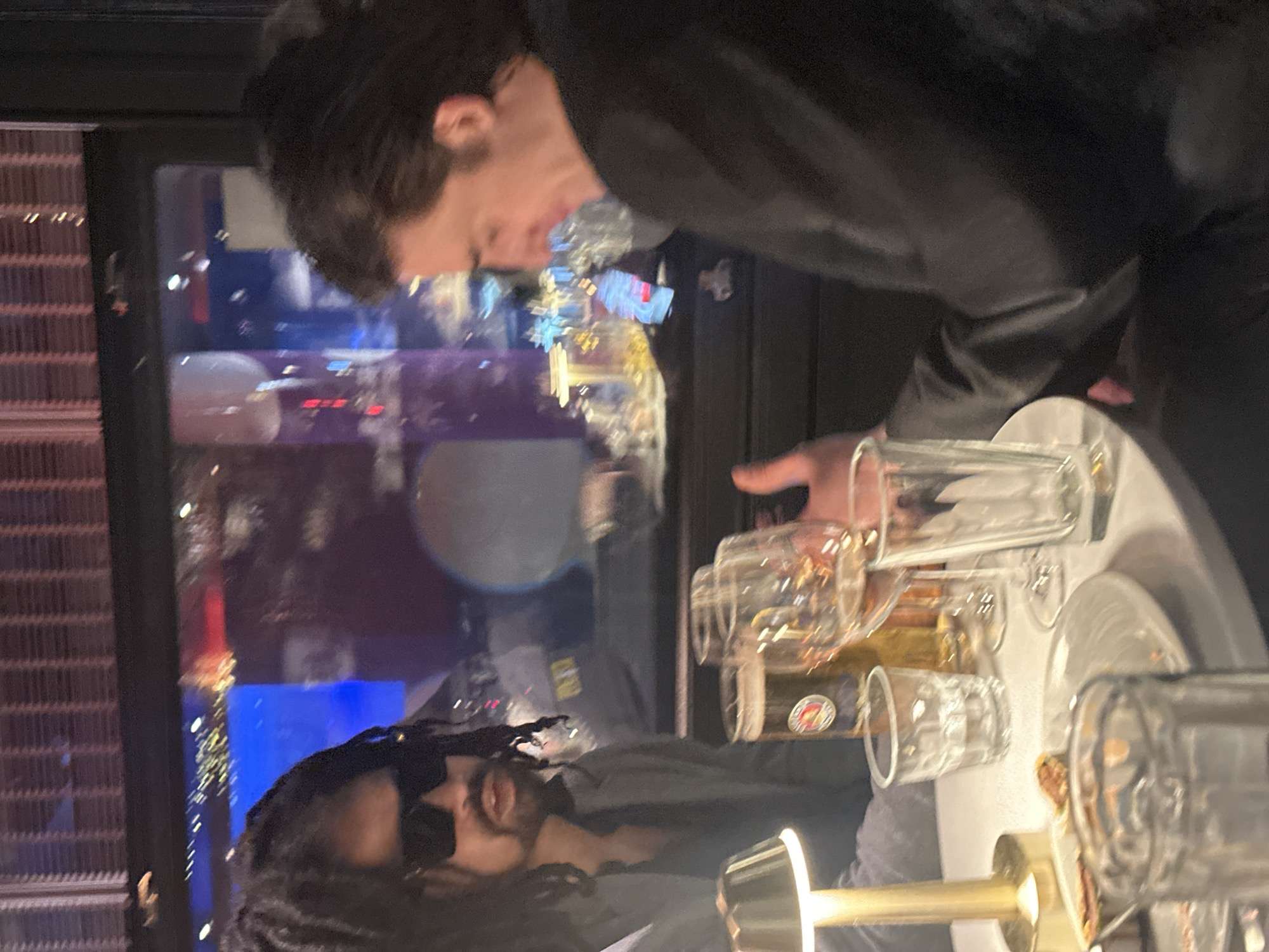 London diners share photos on smartphones during evening out