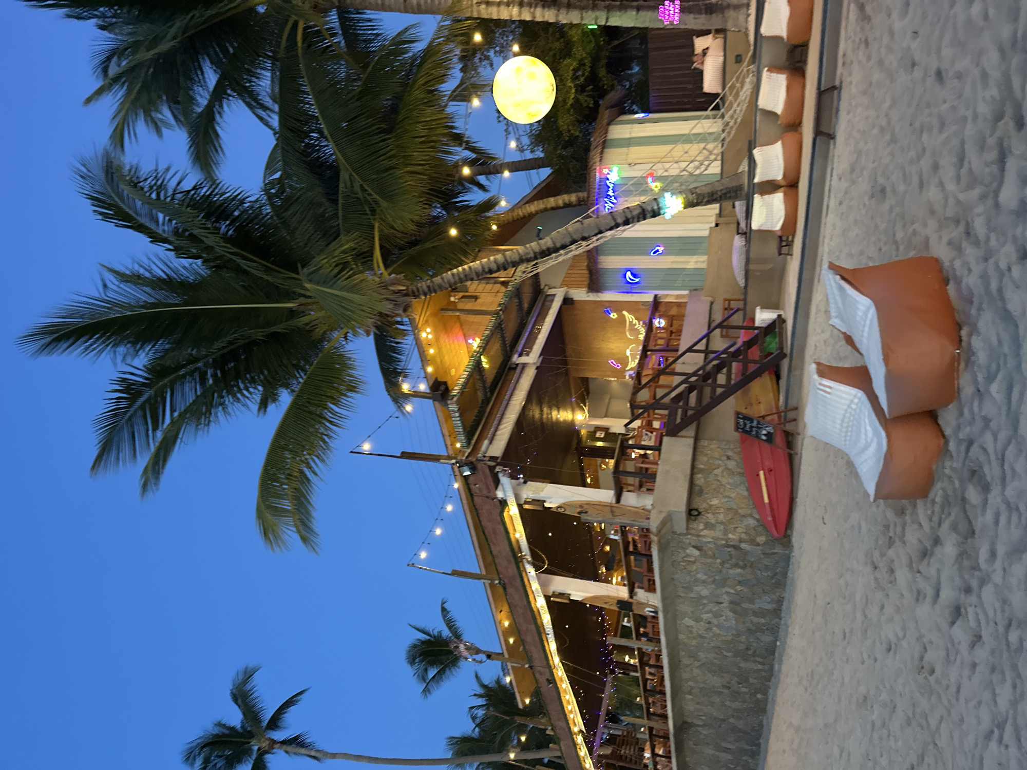 Ko Samui beach bar and shoreline at dusk