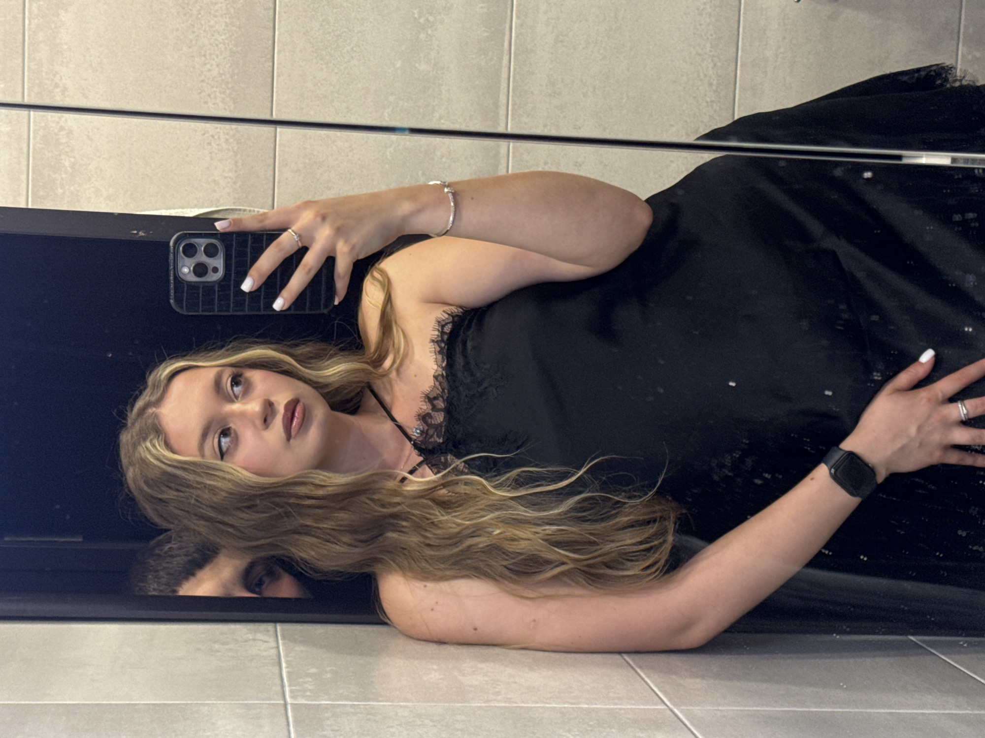 Mirror selfie session on a tiled floor in Plovdiv
